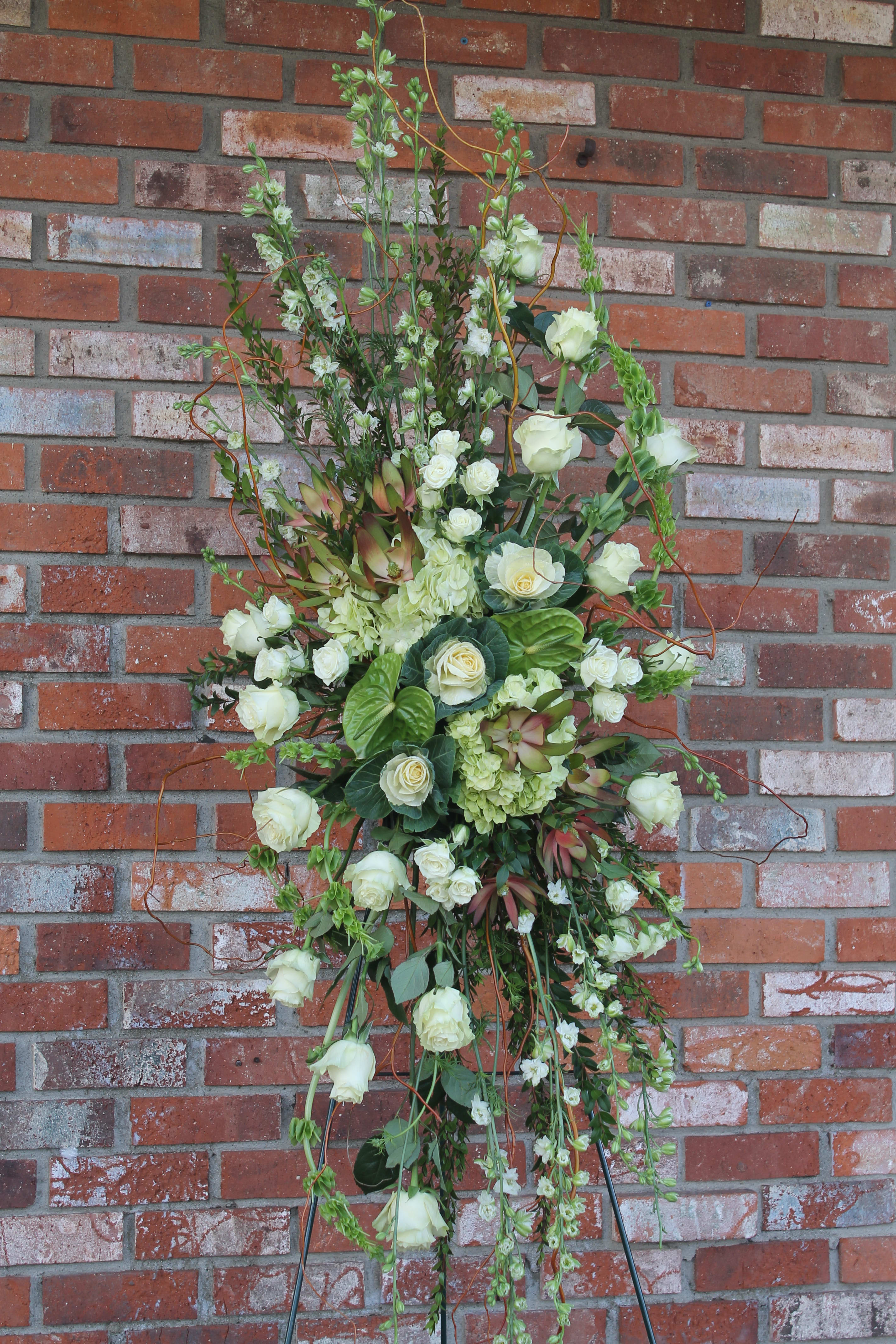 Deep Sleep - Bells of Ireland, Larkspur, Leucadendron, Kale, Hydrangea, Spray Rose, Rose, Anthurium, Curly Wilow