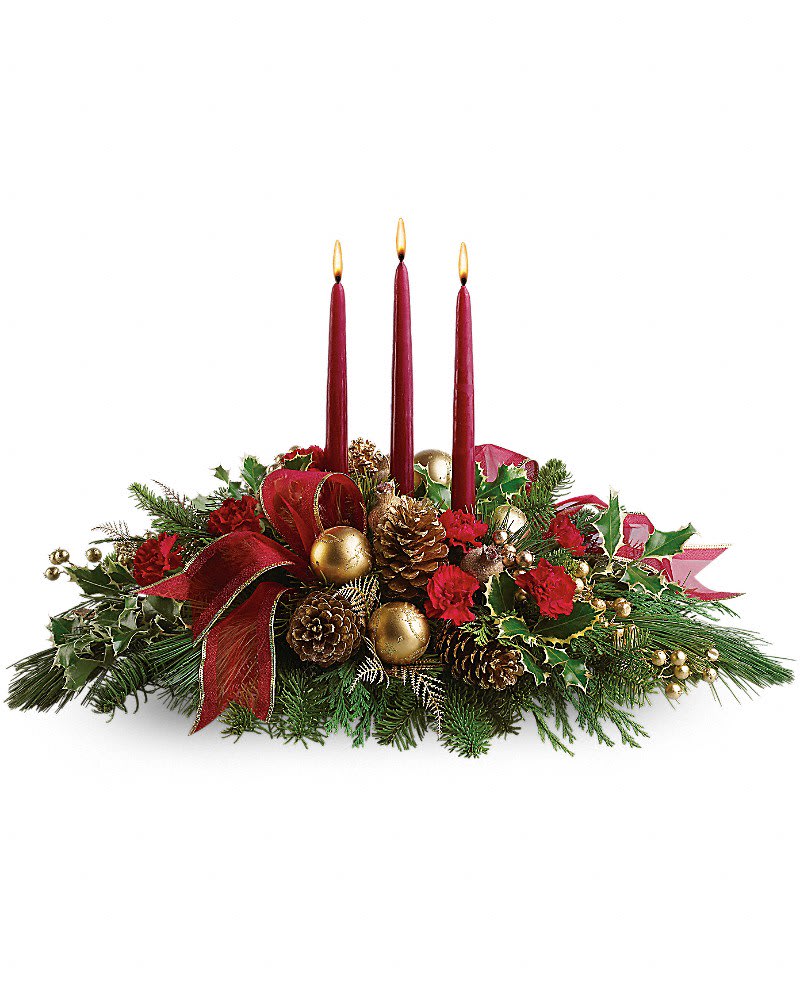 All Is Bright - All will be bright this season when you order this joyful Christmas arrangement. A lovely centerpiece, it will light up the holiday festivities beautifully. Miniature carnations are artfully on display with merry touches like shimmery ornaments, pinecones, berries, organza ribbon and holiday greens. Three graceful red taper candles add the perfect magical touch.