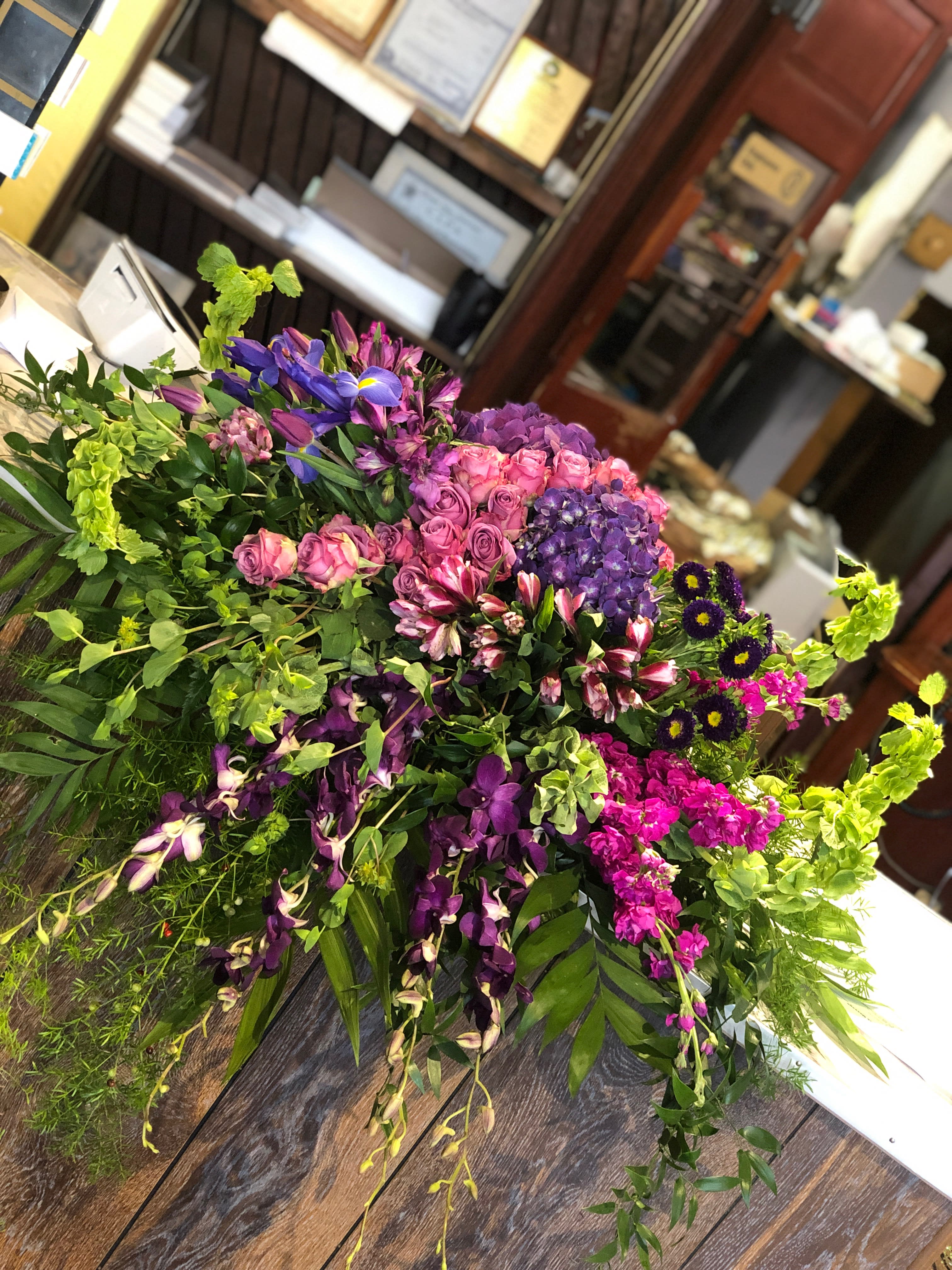 Large mixed bouquet with purple, pink, and green flowers