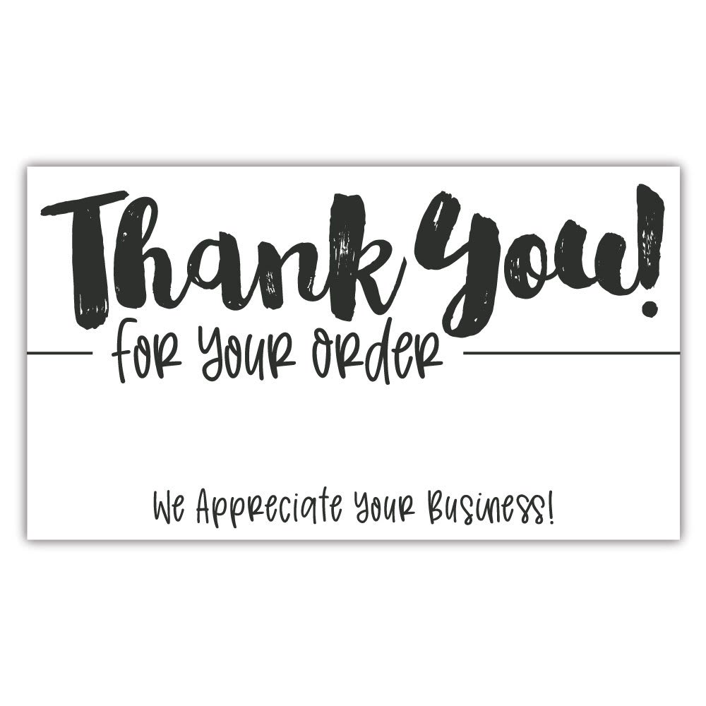 White thank-you card with black handwritten text