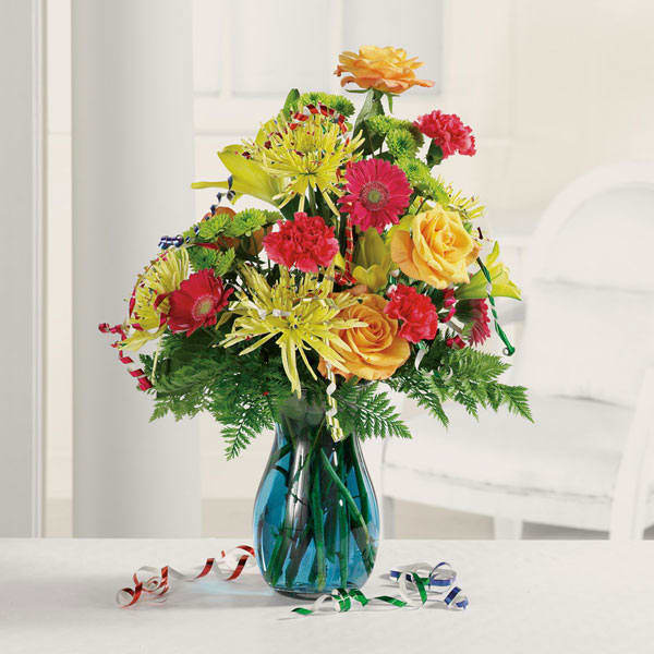 Birthday Stems &amp; Streamers - It's a birthday party in a vase! Roses, Fuji mums, Asiatic lilies, carnations and Gerbera daisies all decked out with streamers and your "Happy Birthday" wishes.