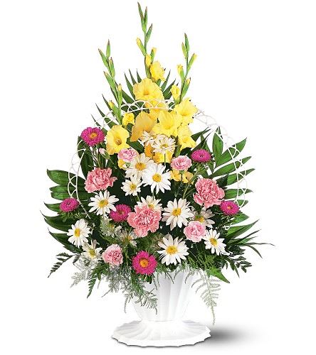 TF187-4 Basket Of Faith - One arrangement with pink carnations and asters, white daisies, yellow gladioli and soft foliages is delivered in a white funeral basket with handle. Approximately 21" W x 33" H