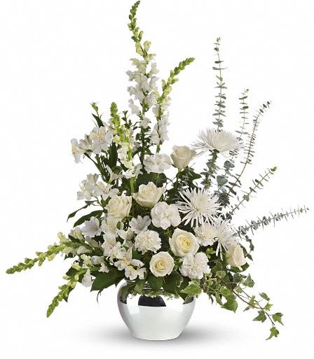 T265-1A Serene Reflections Bouquet - An elegant expression of caring, this beautiful bouquet of white roses and other favorites in a silver jardiniere vase will be a lovely addition to the service. The exquisite bouquet includes white roses, white alstroemeria, white carnations, white snapdragons and white spider chrysanthemums, accented with assorted greenery. Delivered in a silver jardinere vase. Approximately 31" W x 35" H  