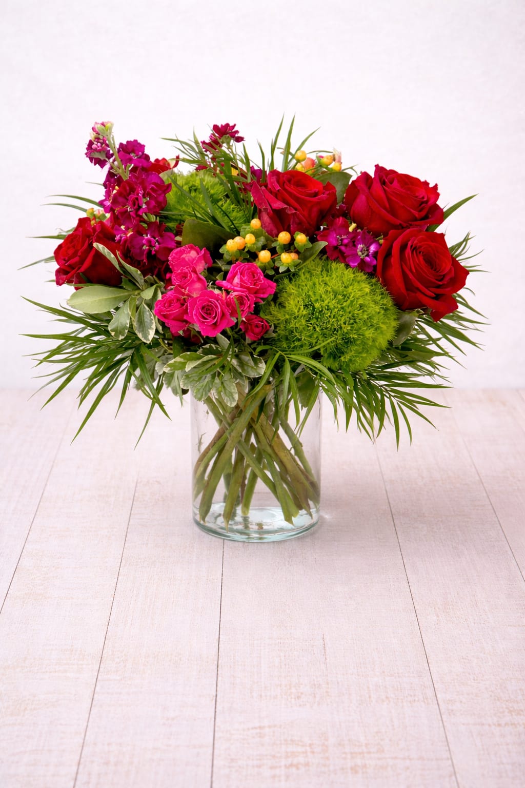 Love Out Loud  - Product Description  Love Out Loud is a bold Valentine’s Day flower arrangement in a clear glass vase, hand designed by a local East Moline florist with delivery available.  Love Out Loud features an expressive mix of vivid pinks, rich reds, and lush greenery, created for someone who believes love should be celebrated openly and without holding back.  Love Out Loud is available for Valentine’s Day flower delivery in East Moline, Moline, Rock Island, Silvis, Davenport, and Bettendorf, making it a striking way to celebrate love throughout the Quad Cities.