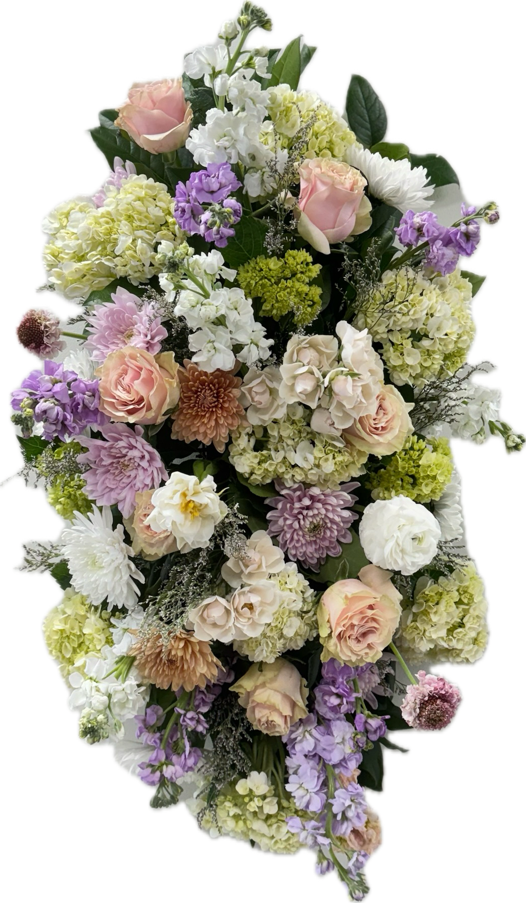 Graceful Farewell Standing Spray - Graceful Farewell is a mix of warm and cool pastel Spring colors to evoke soft comfort in memory of a warm spirit. Featuring mini green hydrangeas, cream roses, soft yellow stock, light pink roses, buttery spray roses, light blue delphinium, lavender stock, and tulips.  This arrangement is thoughtfully designed using the freshest flowers available for the season. While the overall look and palette will be honored, specific flowers may vary. Advance notice is requested for funeral arrangements due to the scale of these designs.
