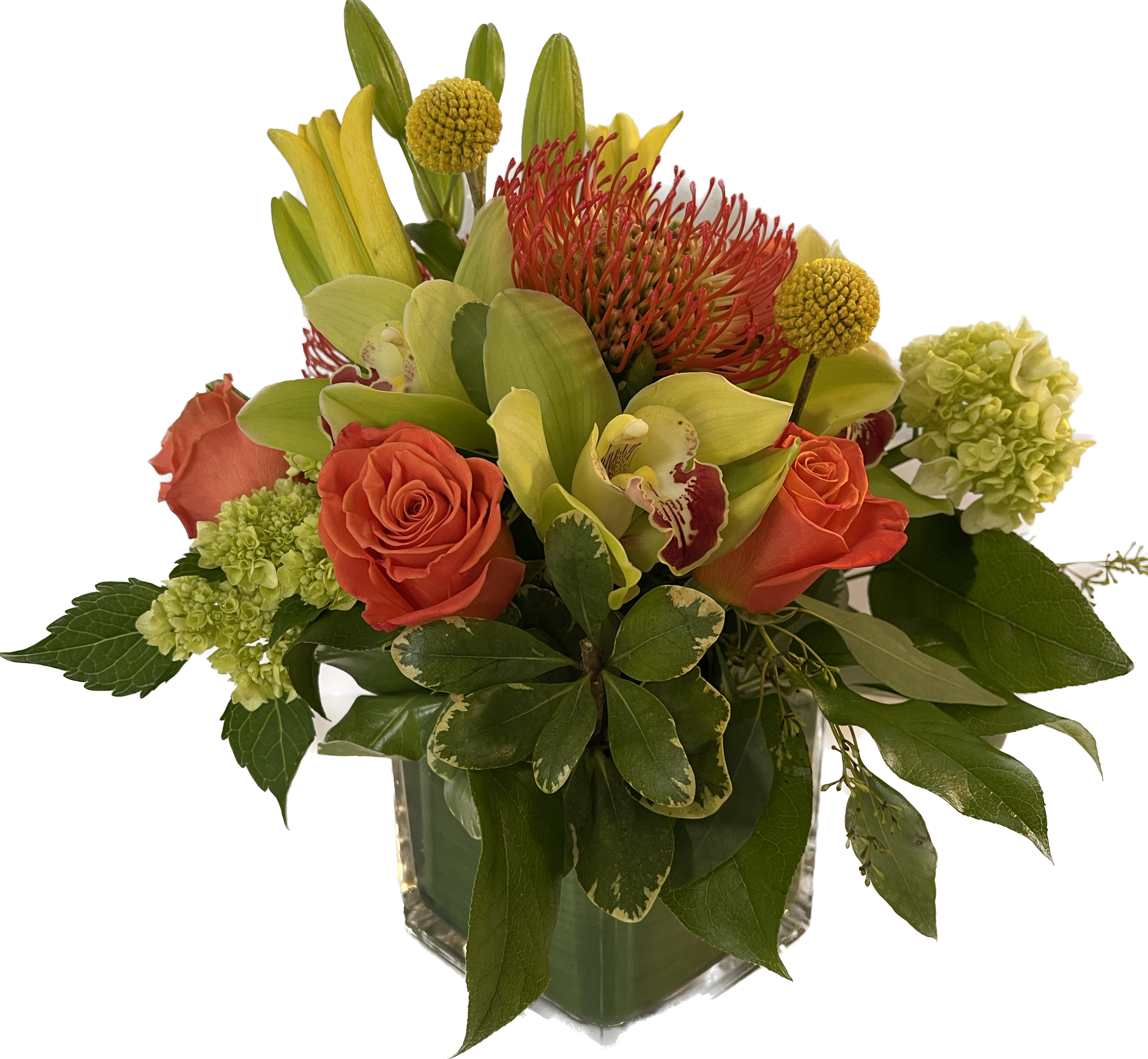 Orange roses and green orchids in a clear glass vase