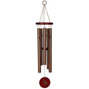 Wooden wind chime with a red circular pendant