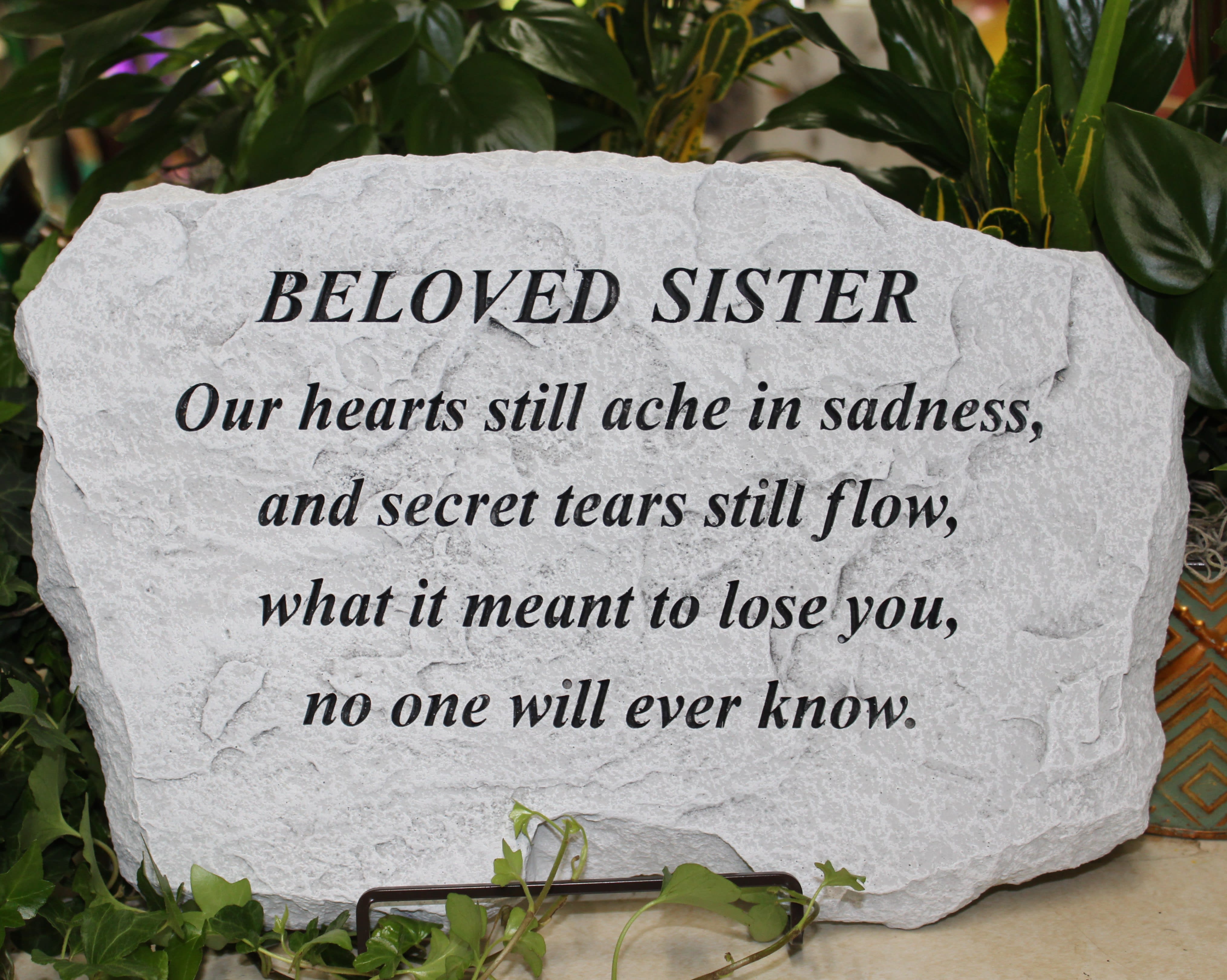 Memorial stone with a sympathy message for a beloved sister