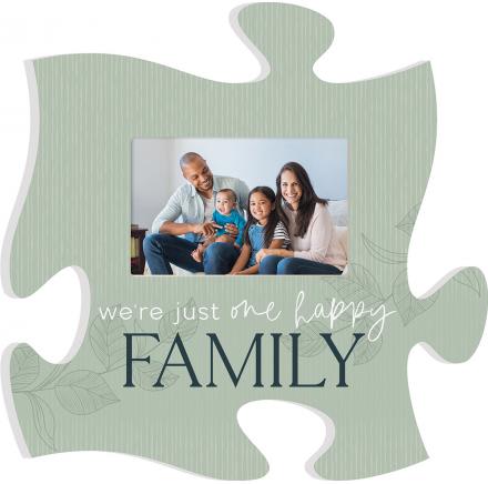 Puzzle-piece photo frame with a family picture and the words "we're just one happy FAMILY"