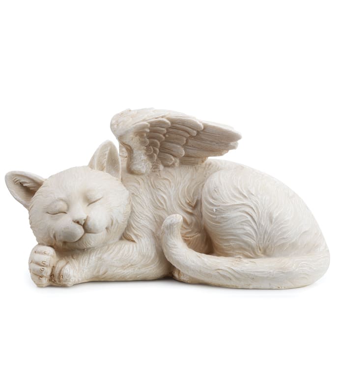 Sleeping white cat figurine with small wings