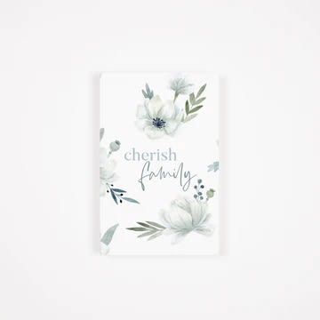 Floral card with the words "cherish family" and pale watercolor flowers