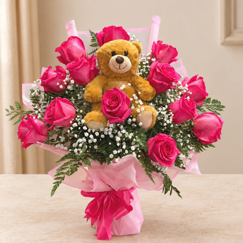 Pink rose bouquet with a teddy bear in the center