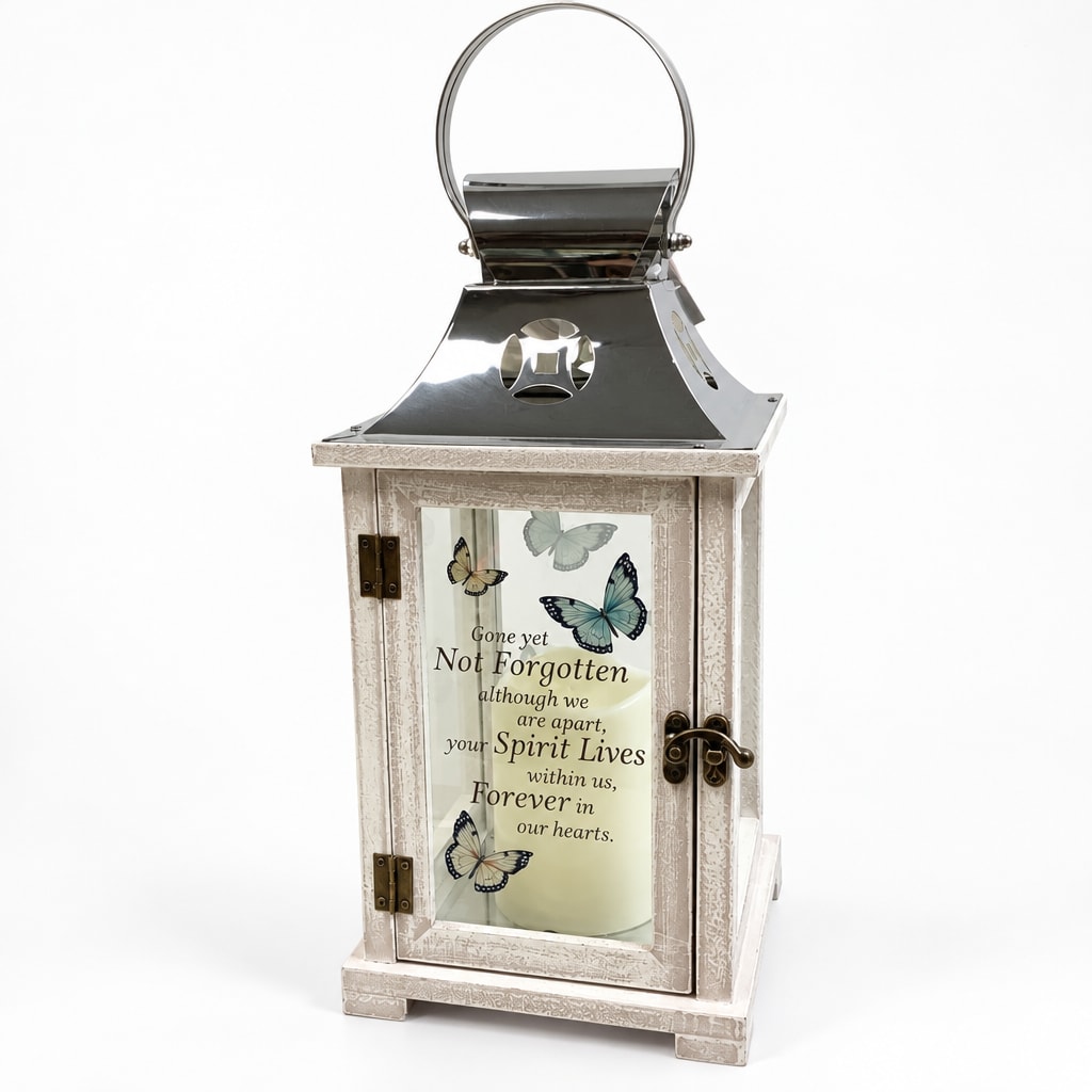 Decorative memorial lantern with butterfly design and a candle inside