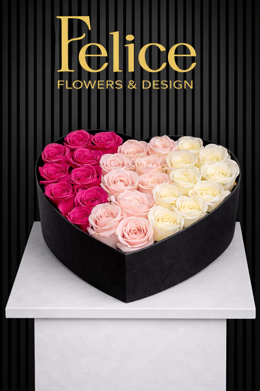 Heart-shaped box of pink and white roses