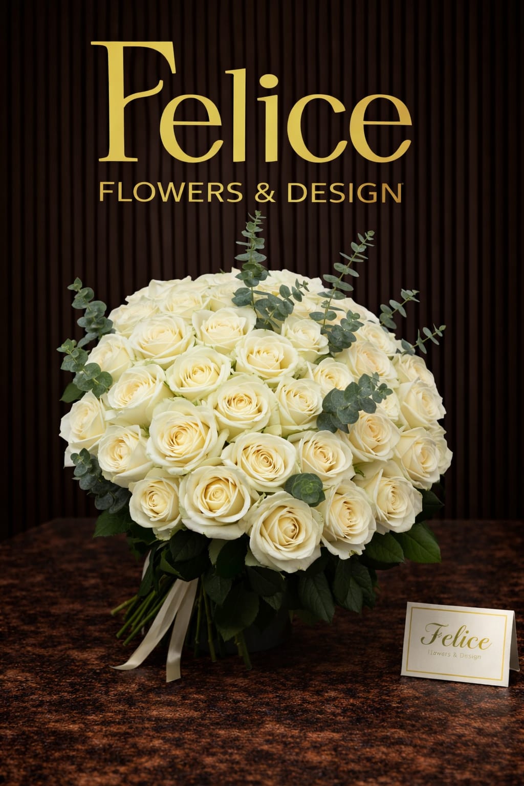 Bouquet of cream roses with eucalyptus accents and ribbon
