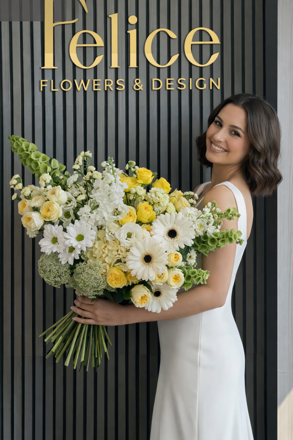 Woman holding a large bouquet of white and yellow flowers