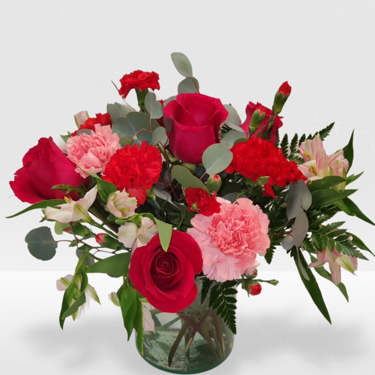 You're Precious by Manny - Mix arrangement with red and pink low cylinder vase