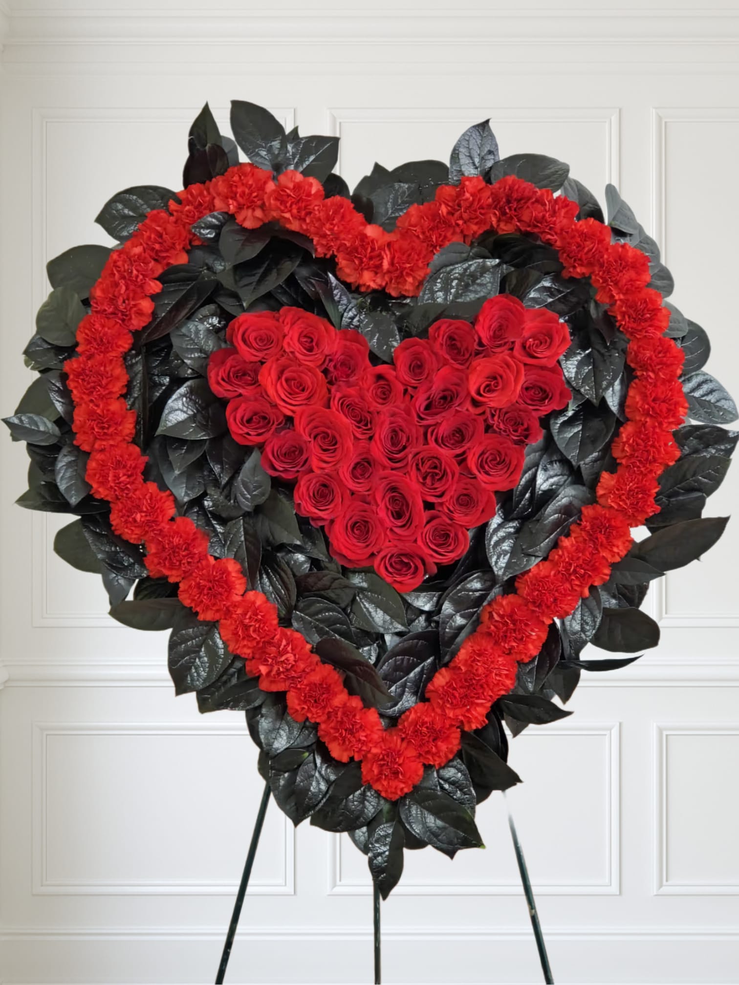 Pure Love Double Heart - Red and black double heart. 40 Red carnations, 30 Red roses, 1bu of lemon leaf tinted balck.