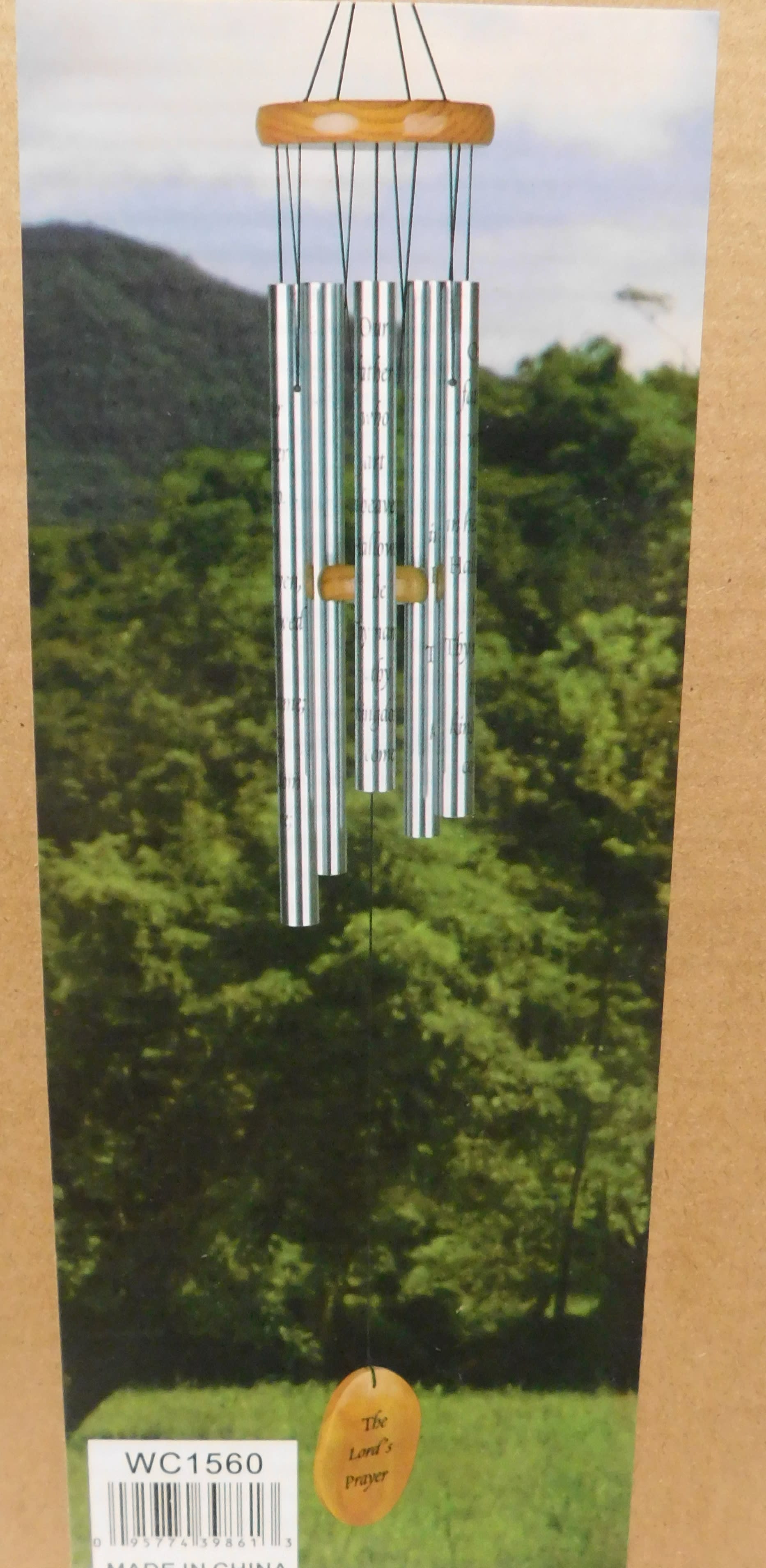 Silver wind chime with a wooden top and prayer tag