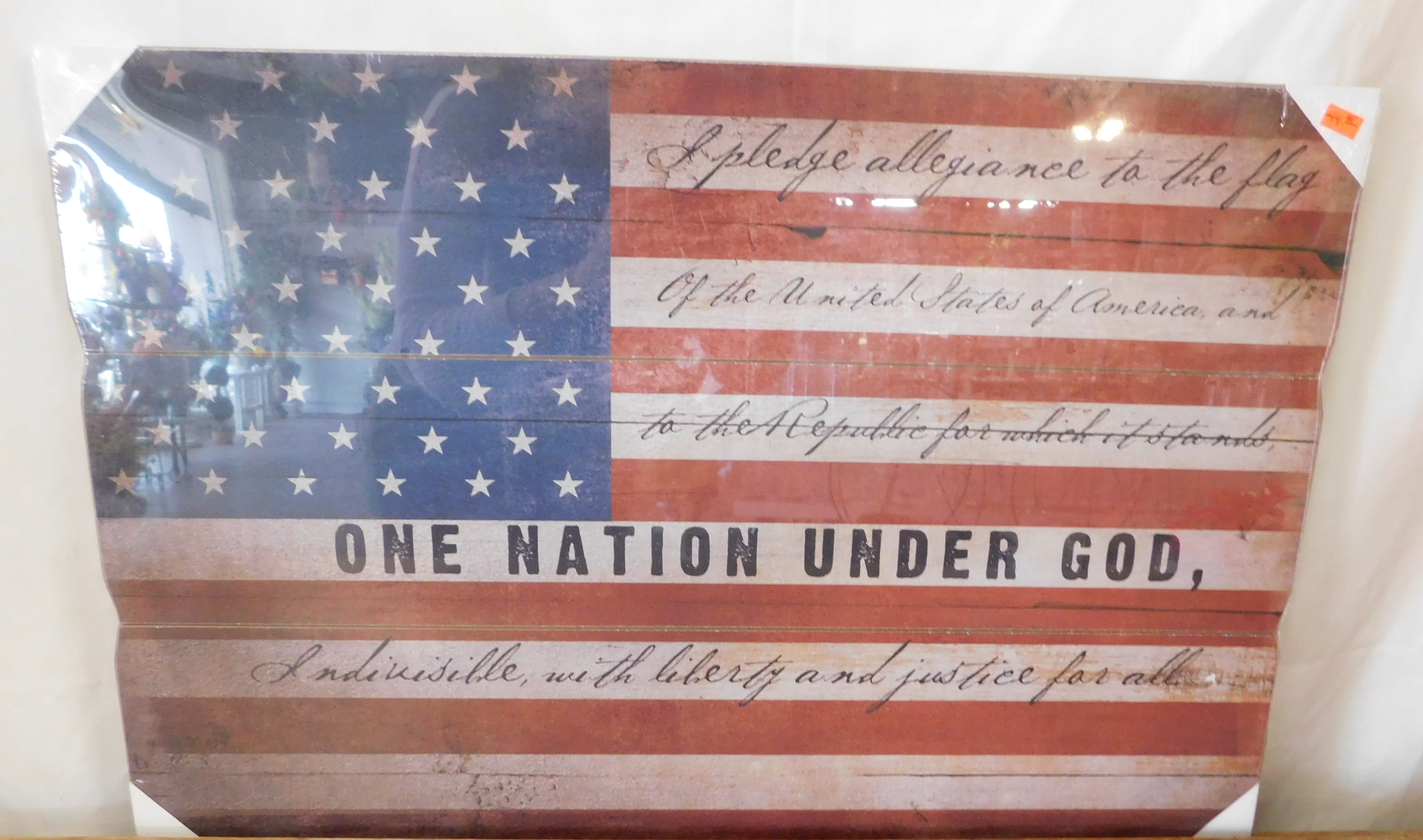 Framed American flag print with patriotic text