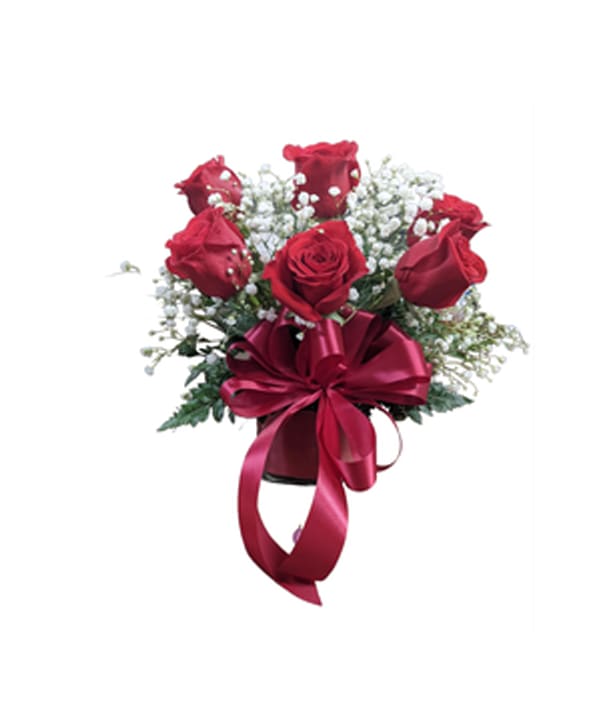 Bouquet of red roses with white baby's breath and a red ribbon
