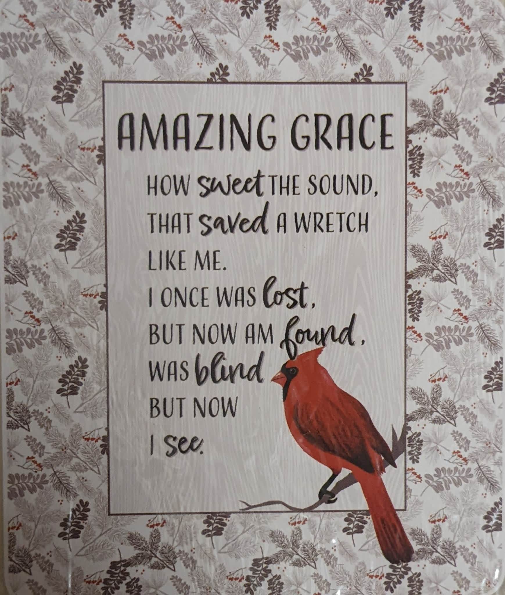 Decorative sign with a cardinal and the words "Amazing Grace"