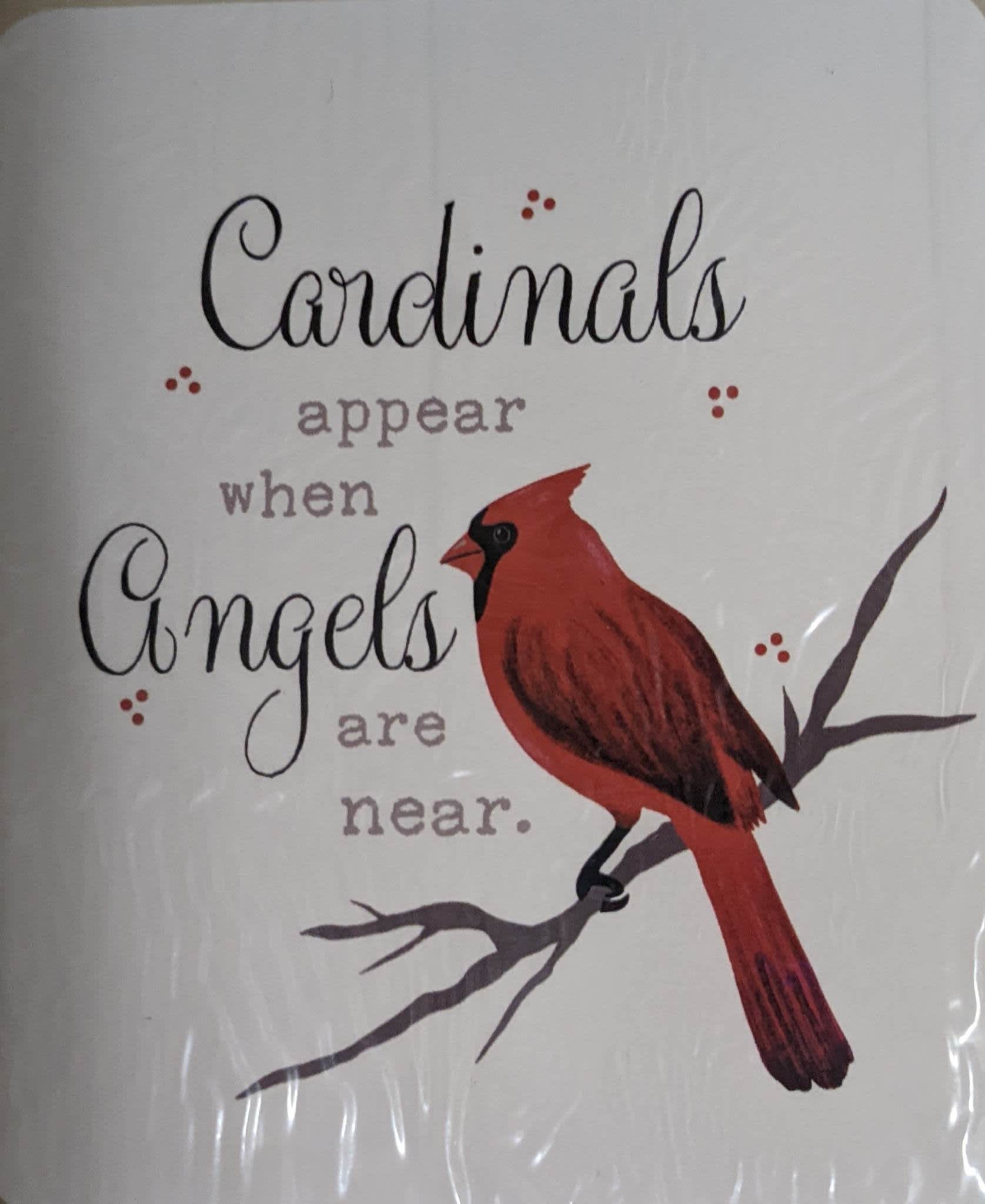 Decorative sign with a red cardinal and the quote "Cardinals appear when Angels are near."