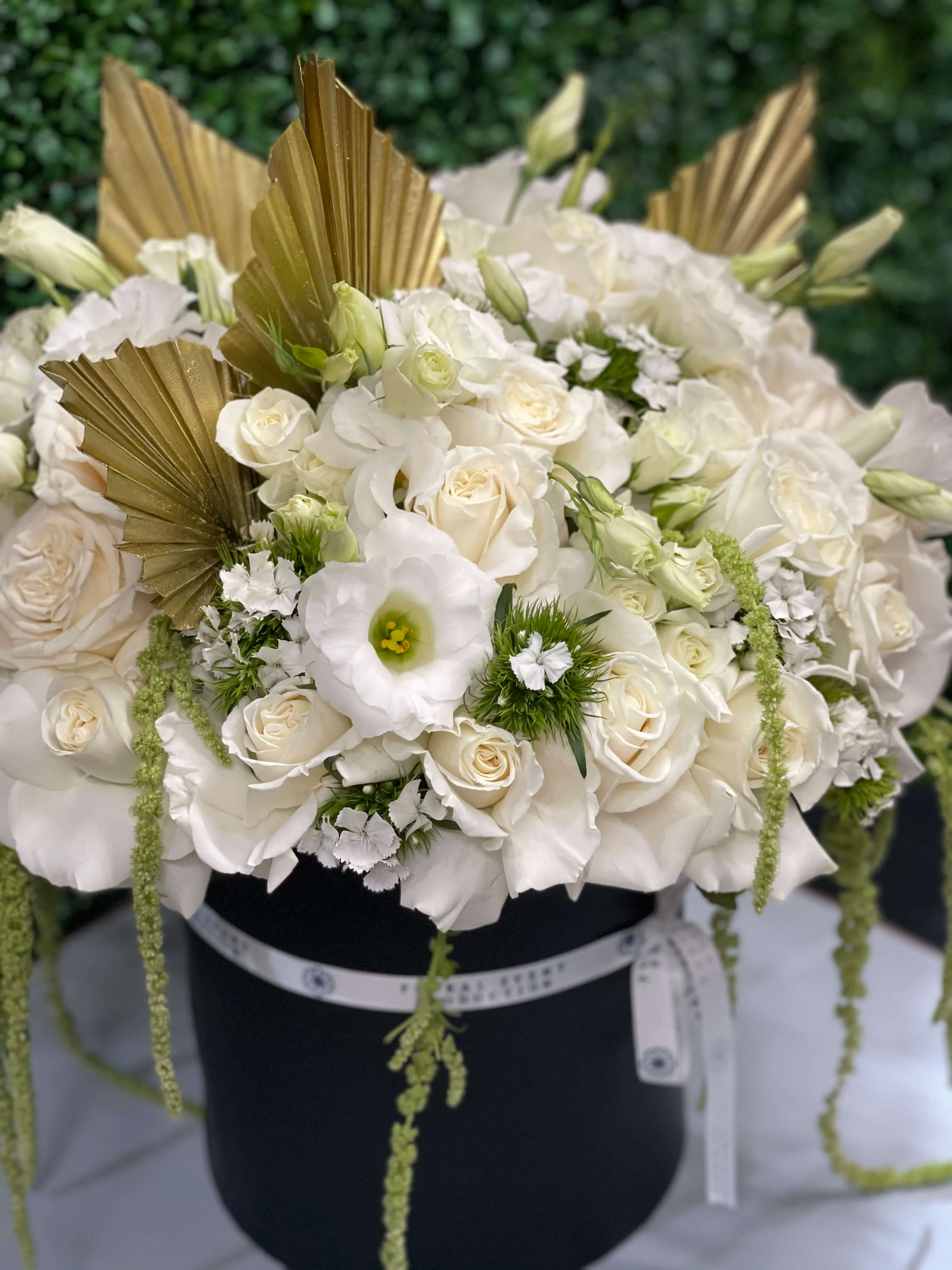 Box of snow white  - This beautiful modern box of mix white flowers are great for any occasion 