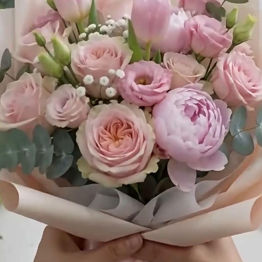 Blush peony romantic bouquet  - Soft, dreamy and unabashedly romantic. Lush pink peonies and garden roses mingle with graceful pink tulips, delicate lisanthus, and a whisper of baby’s breath, all tucked into fresh eucalyptus. Wrapped in blush paper. A bouquet made for the moments that deserve something truly beautiful. Prefect for anniversaries, bridal showers, birthdays or simply saying “I love you” with a single words 