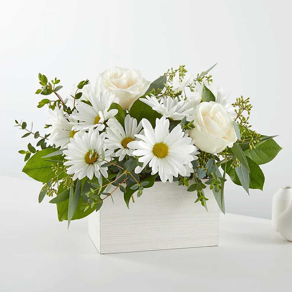 Fresh Linen Box Bouquet - Experience the tranquility and everlasting charm of our Fresh Linen Box Bouquet, beautifully adorned with roses, daisies, and eucalyptus. Approximately 14"H x 15"W.  