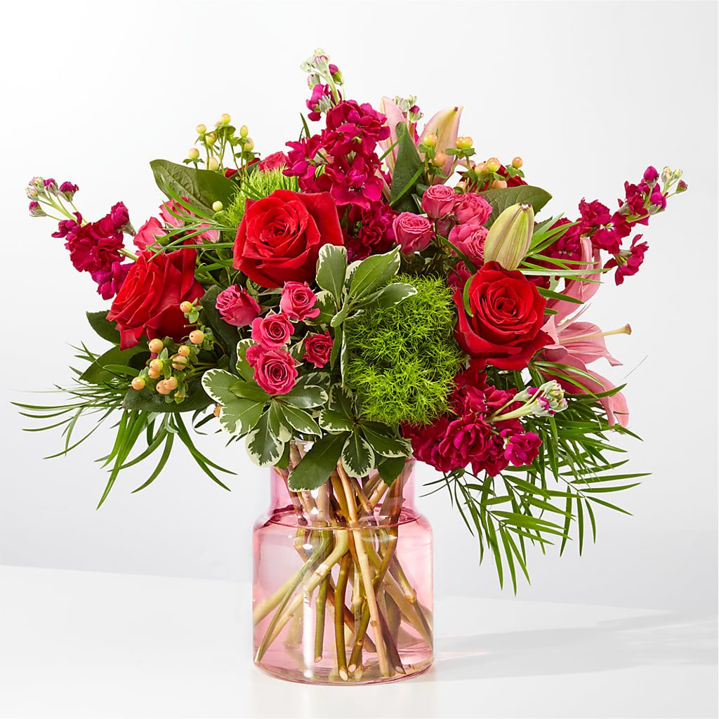 In Every Lifetime Bouquet - Colorful, romantic and blooming with radiance, this gift will make their day joyful and bright. Approximately 17"H x 18"W.