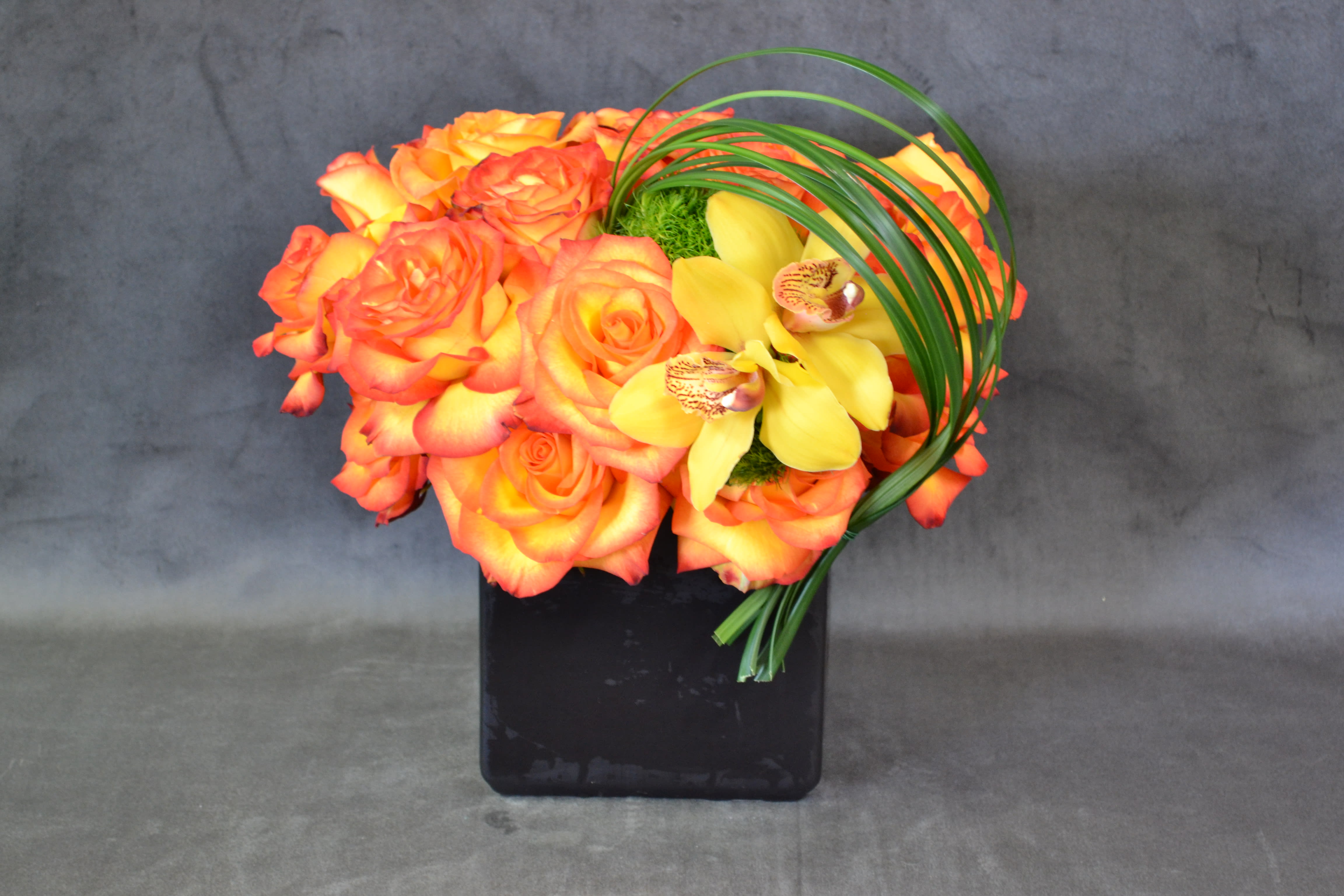 Thinking of you - Roses and cymbidium orchids. any color, any day. 