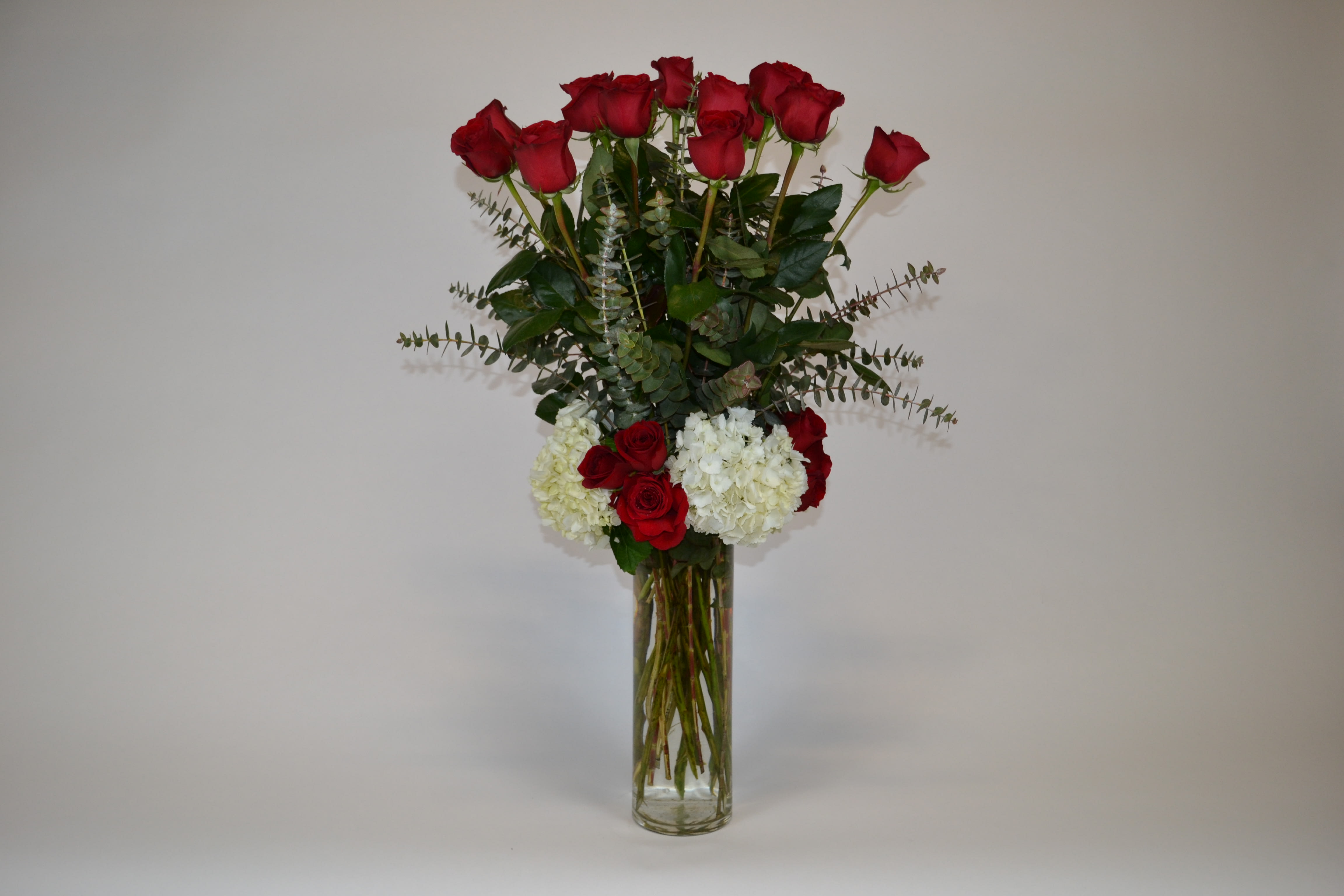 Love Addiction - Long stem red rose, white hyndrengeas with eucalyptus.