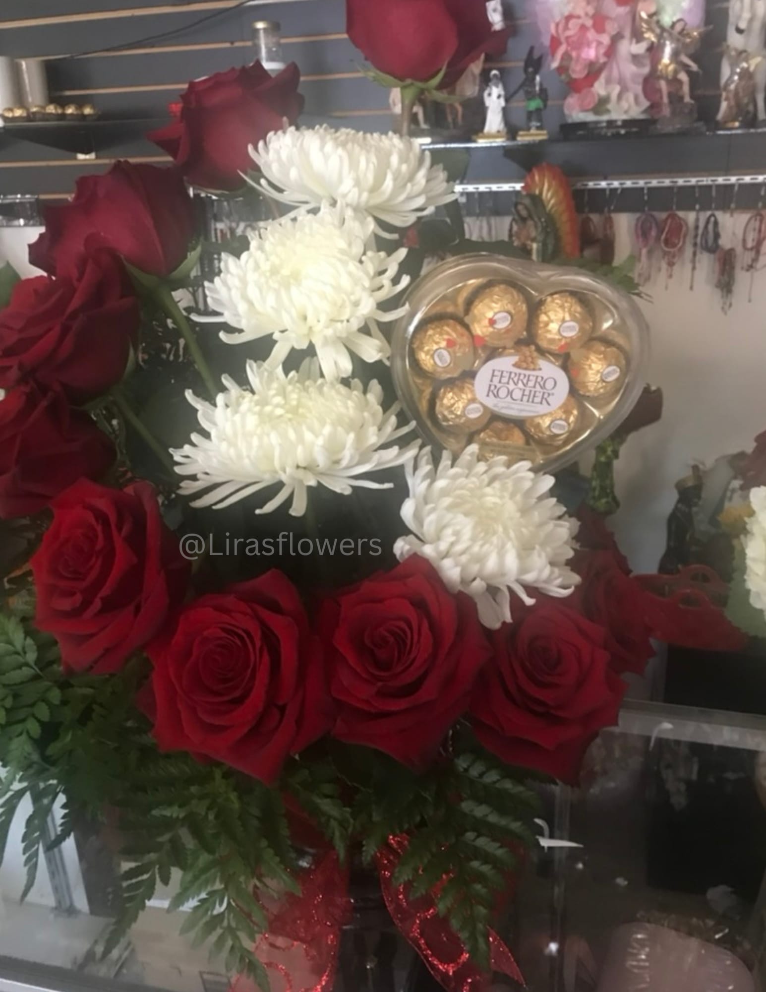 cholates and roses - Spiral arrangment with spiders and choclates for any ocassion