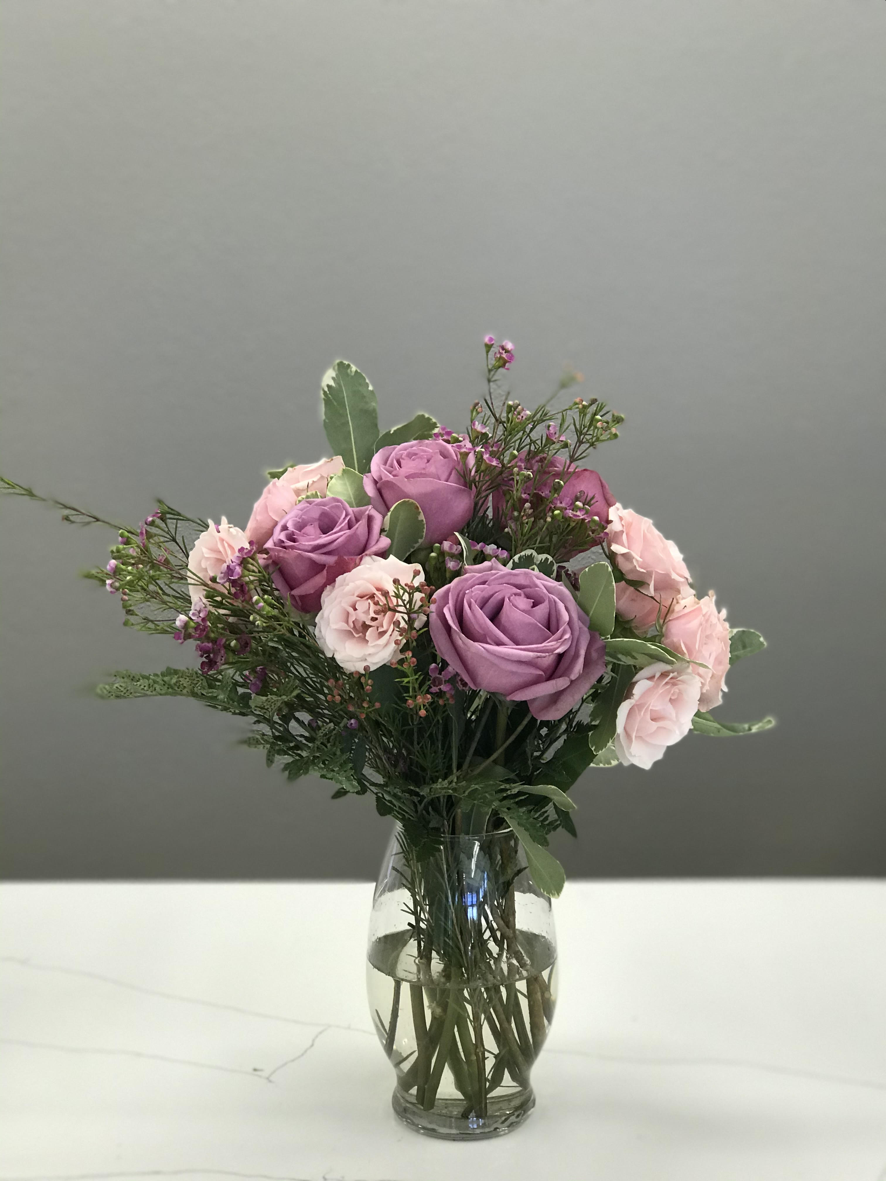 The Rustic Rose - Soft lavender and dusty roses are assembled together for a simple elegant reminder that your loved one is on your heart. 