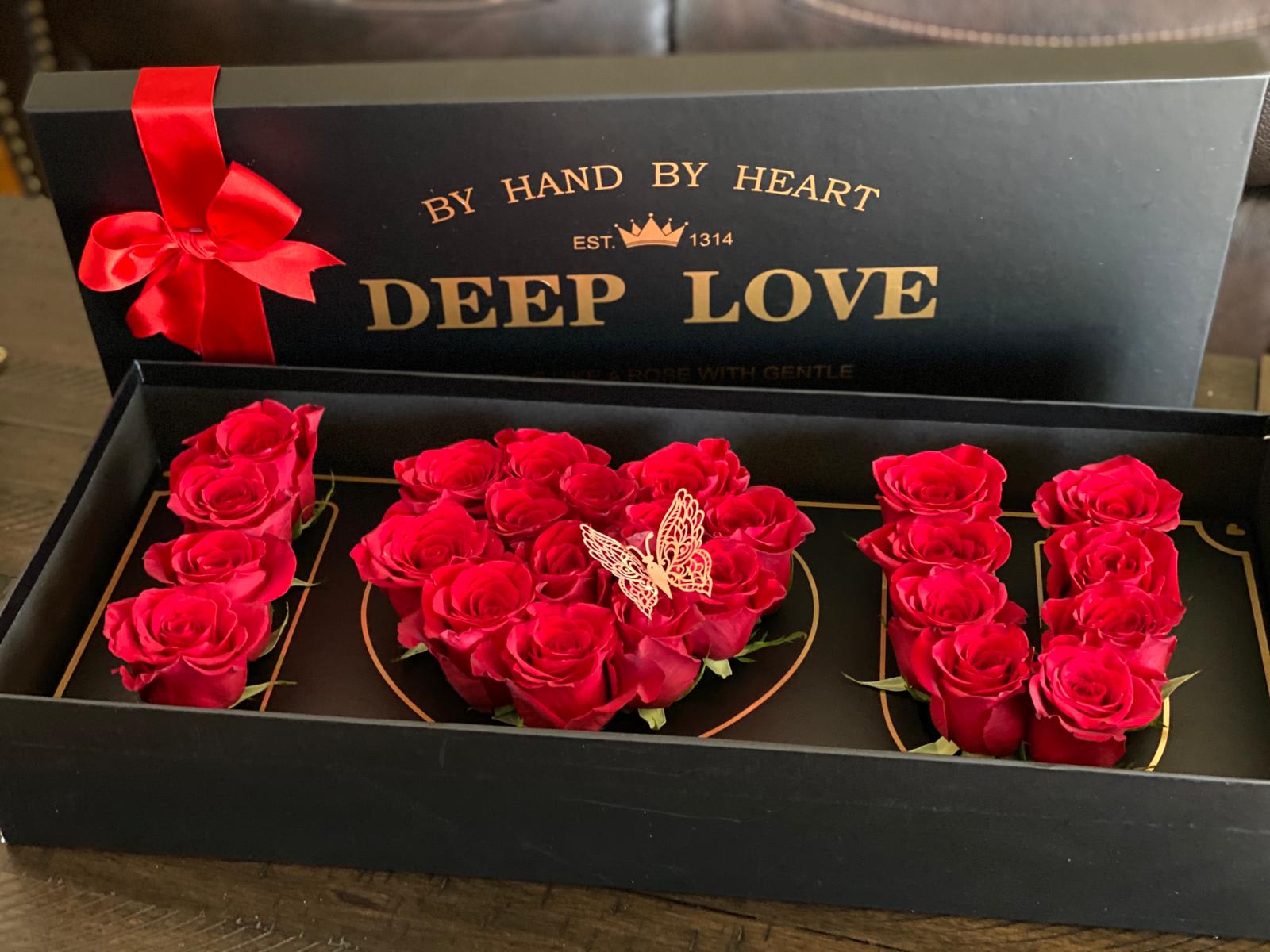I LOVE U, Black Box. - Large Black Box 24" X 10" X 4" With 24 Red Roses. The special option we can put a special message on the cover.
