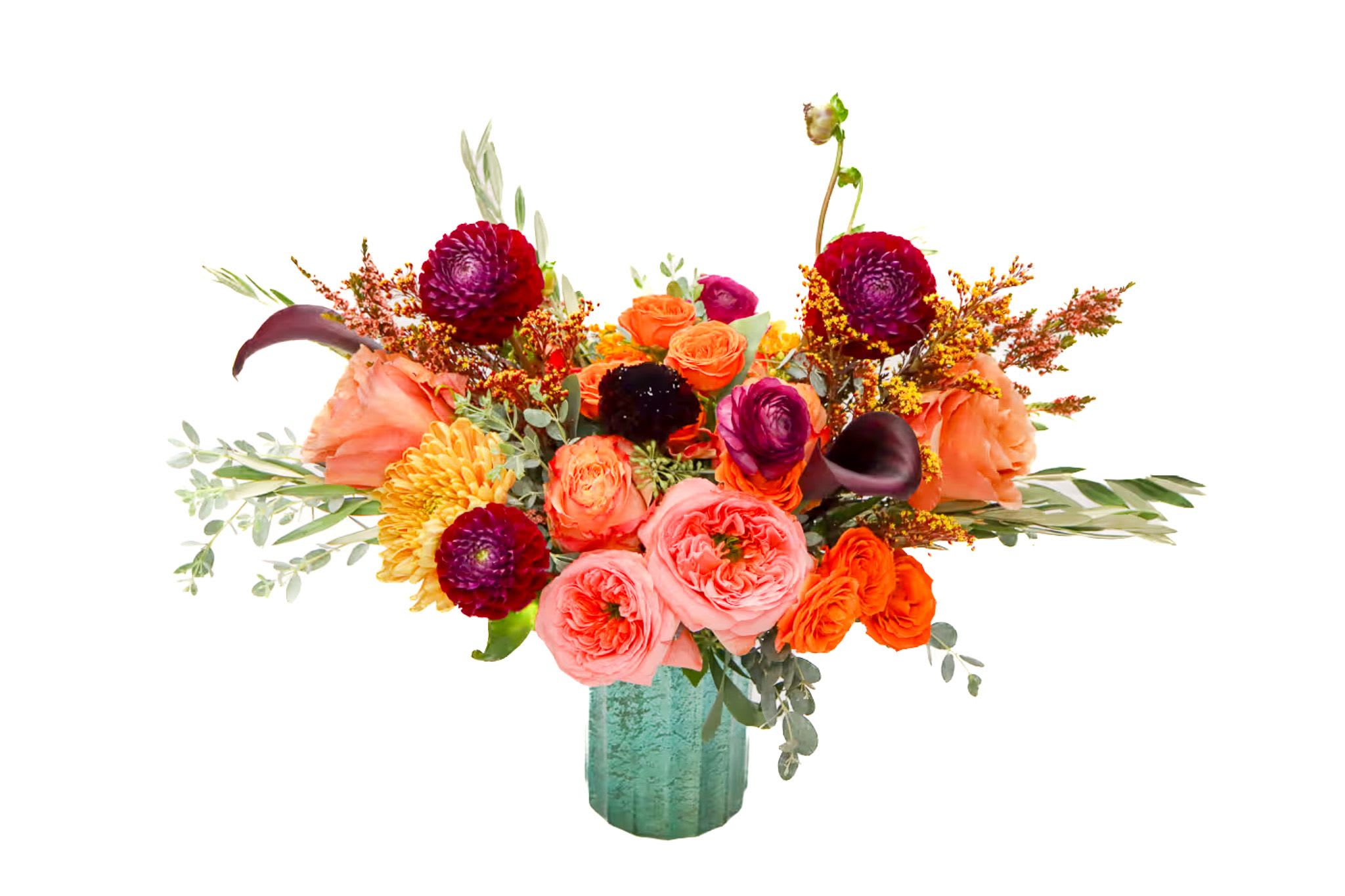 Bright mixed bouquet in a teal vase with roses and orange blooms