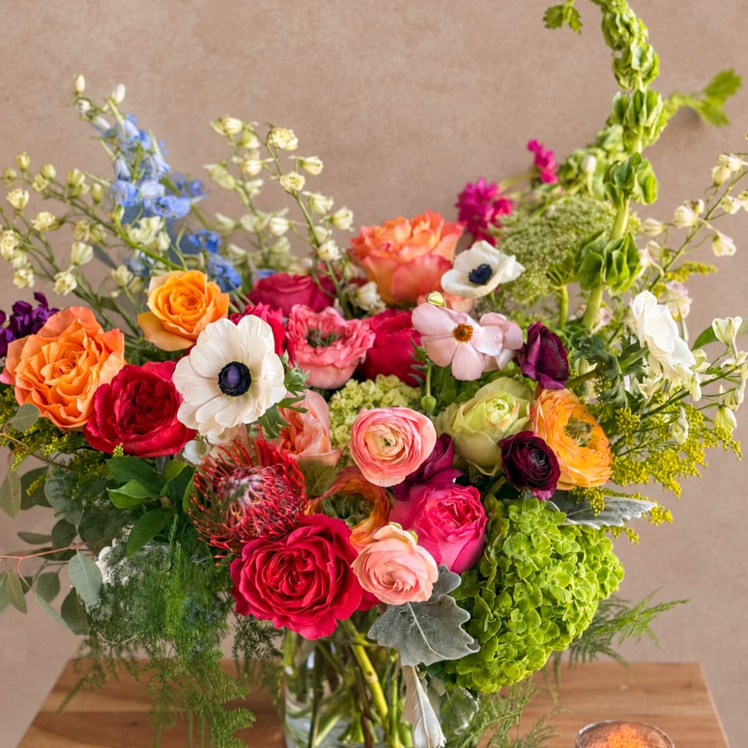 Colorful mixed bouquet in a clear glass vase