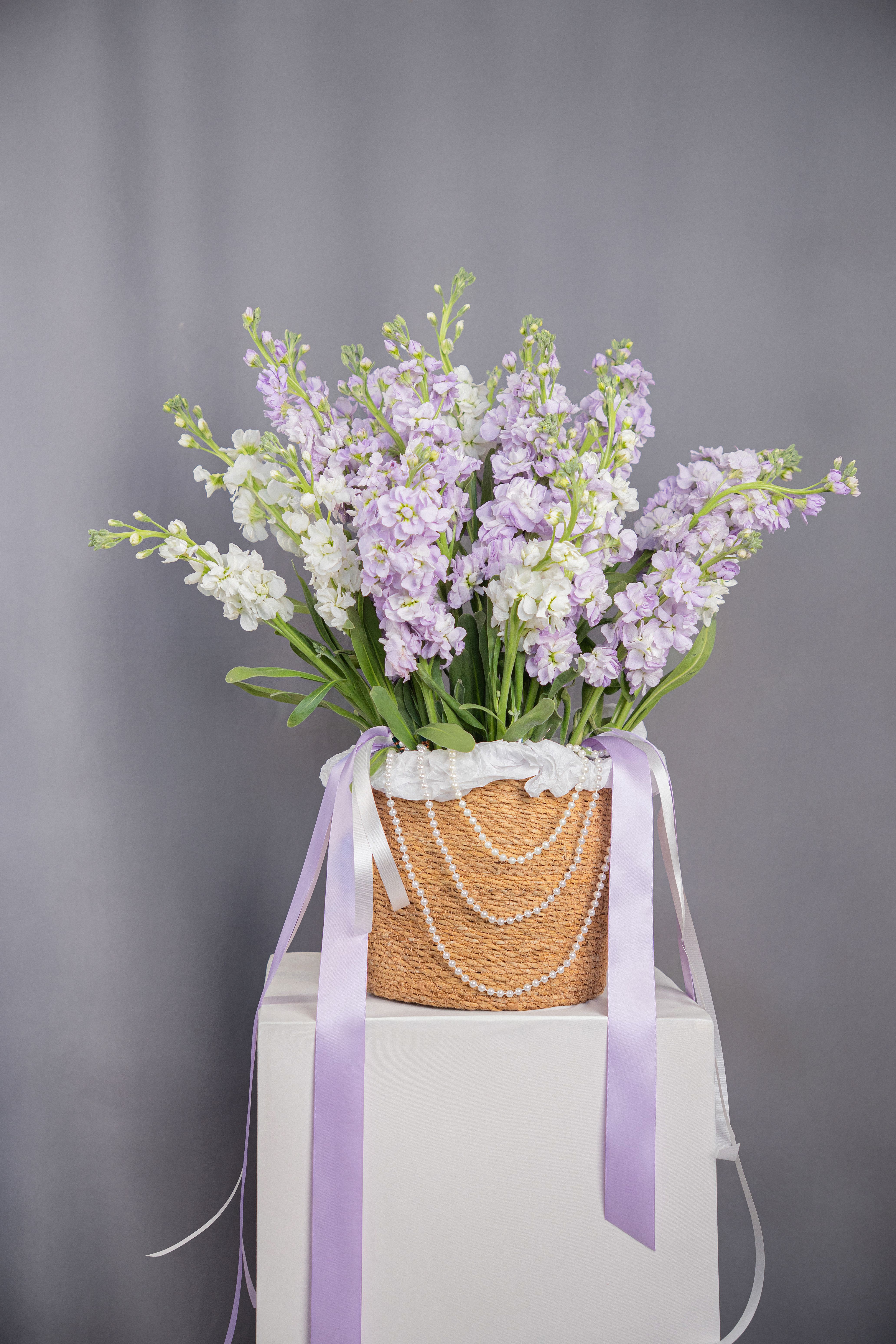 THE BRIDGERTON  BLOOM  - Inspired by regal romance, this delicate lavender arrangement evokes elegance, femininity, and classic charm.