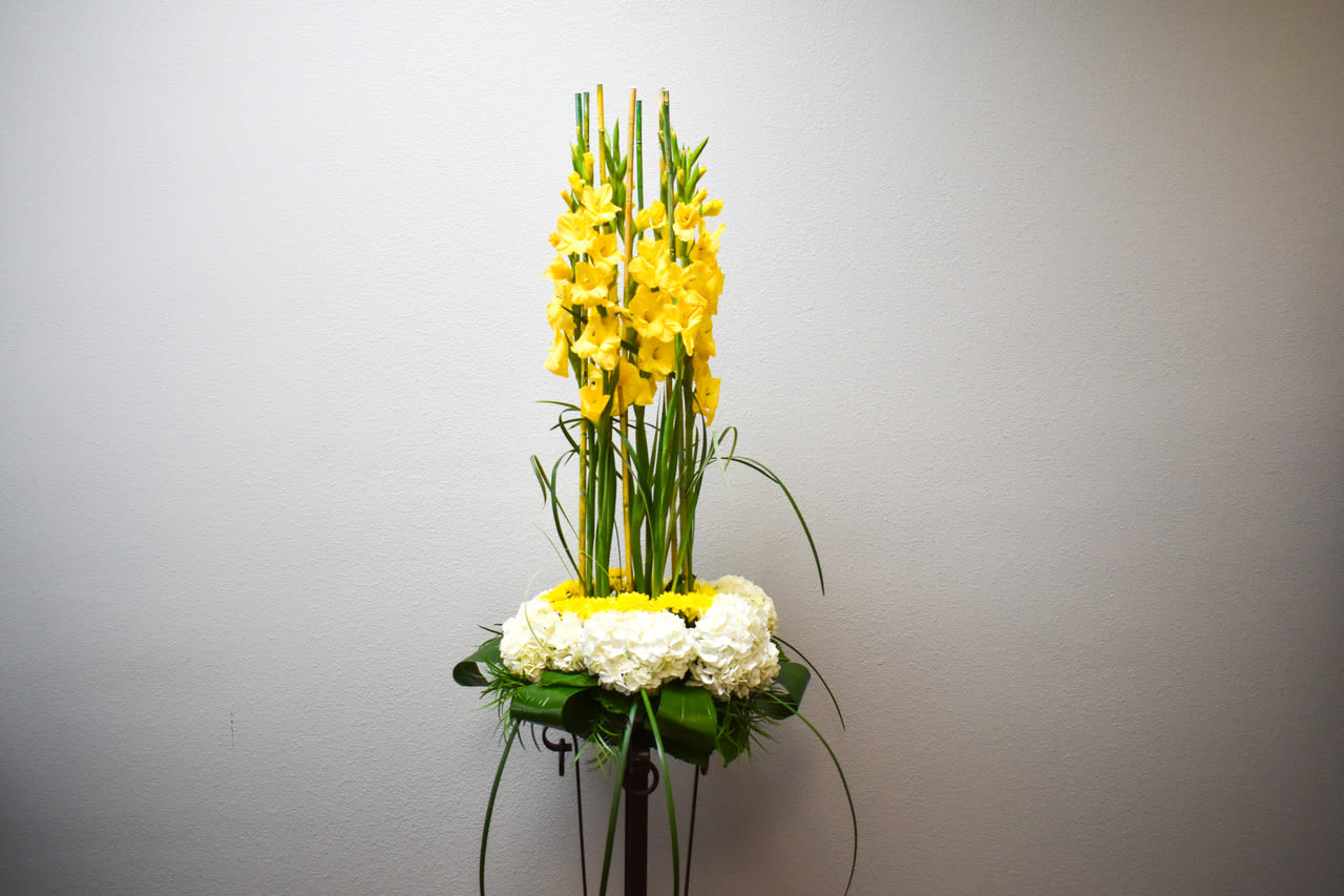 TLSP Gladiola Memorial Tribute - Gladiolus are displayed beautifully from a base of lush flowers such as Hydrangea and cushion mums.  