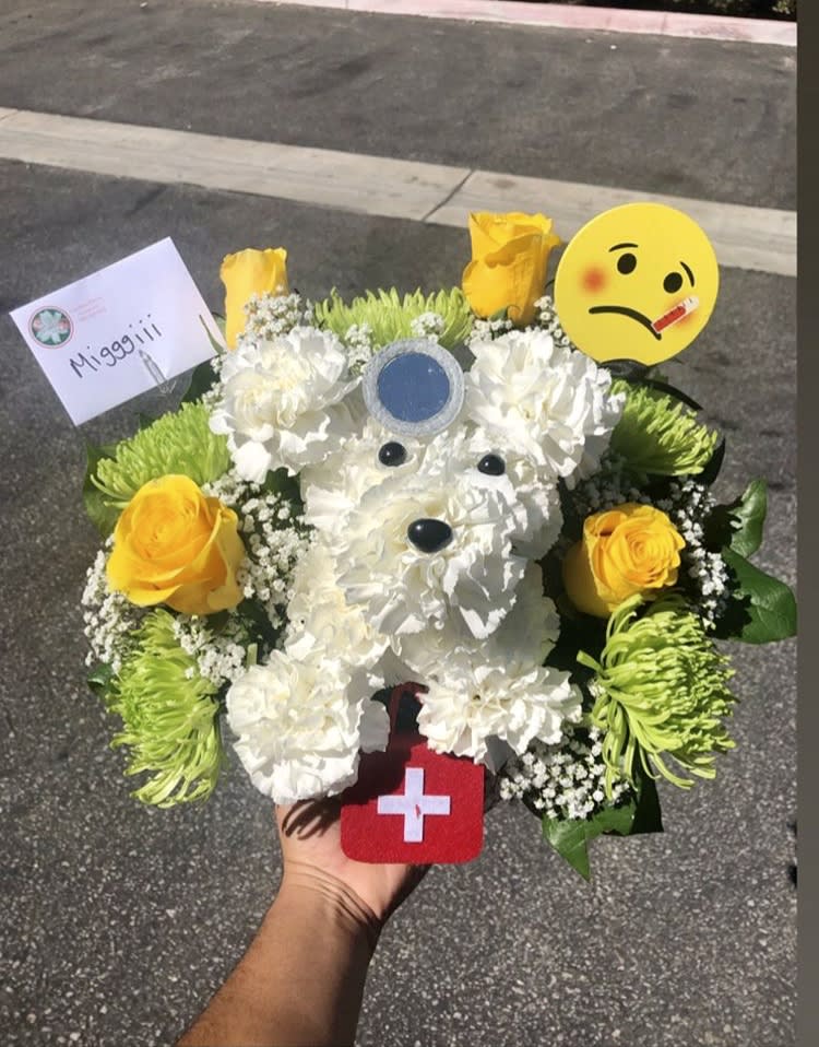 White floral teddy bear bouquet with yellow roses and emoji accents