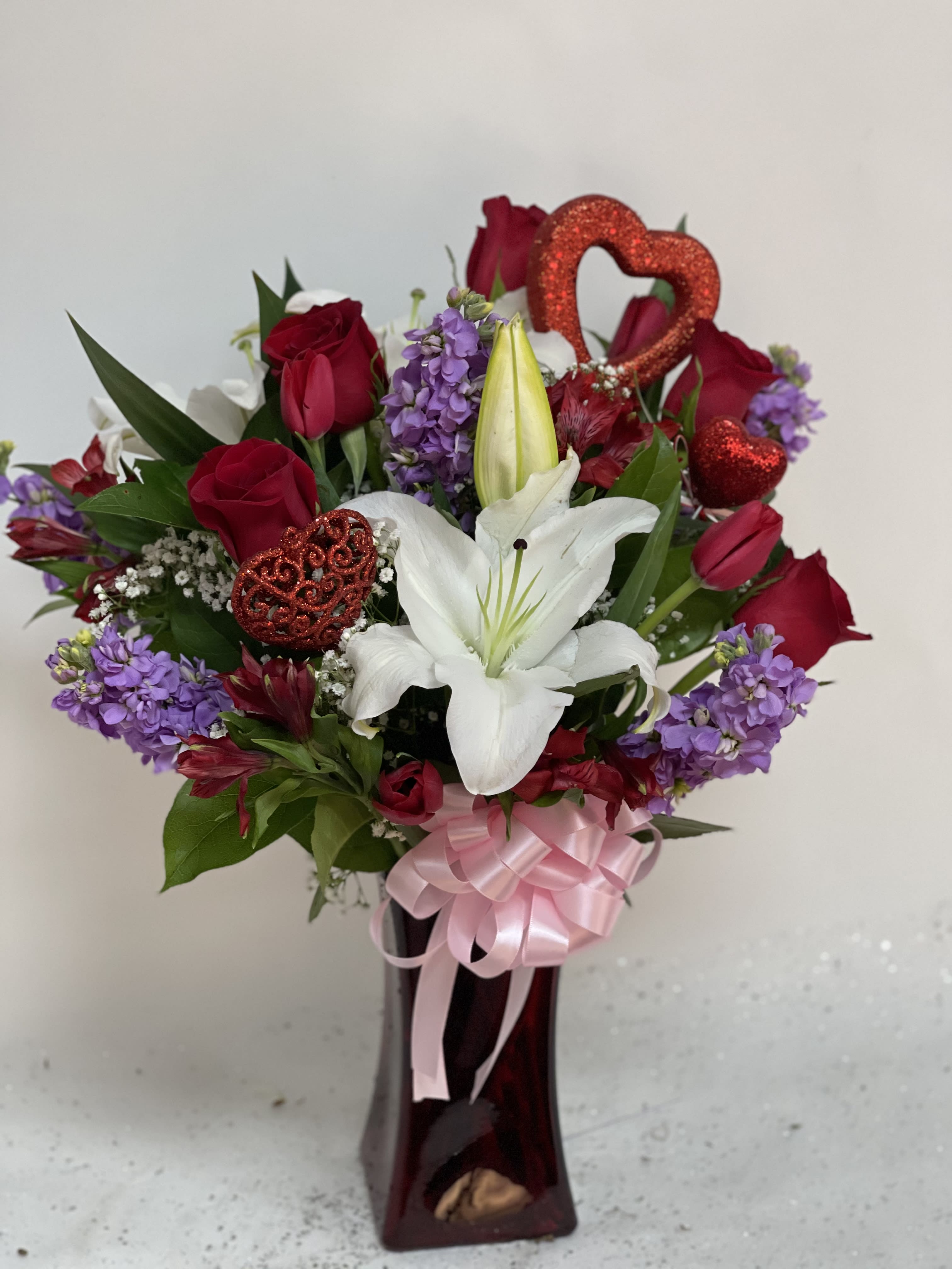 Red vase floral w/ pink bow in Oxnard, CA