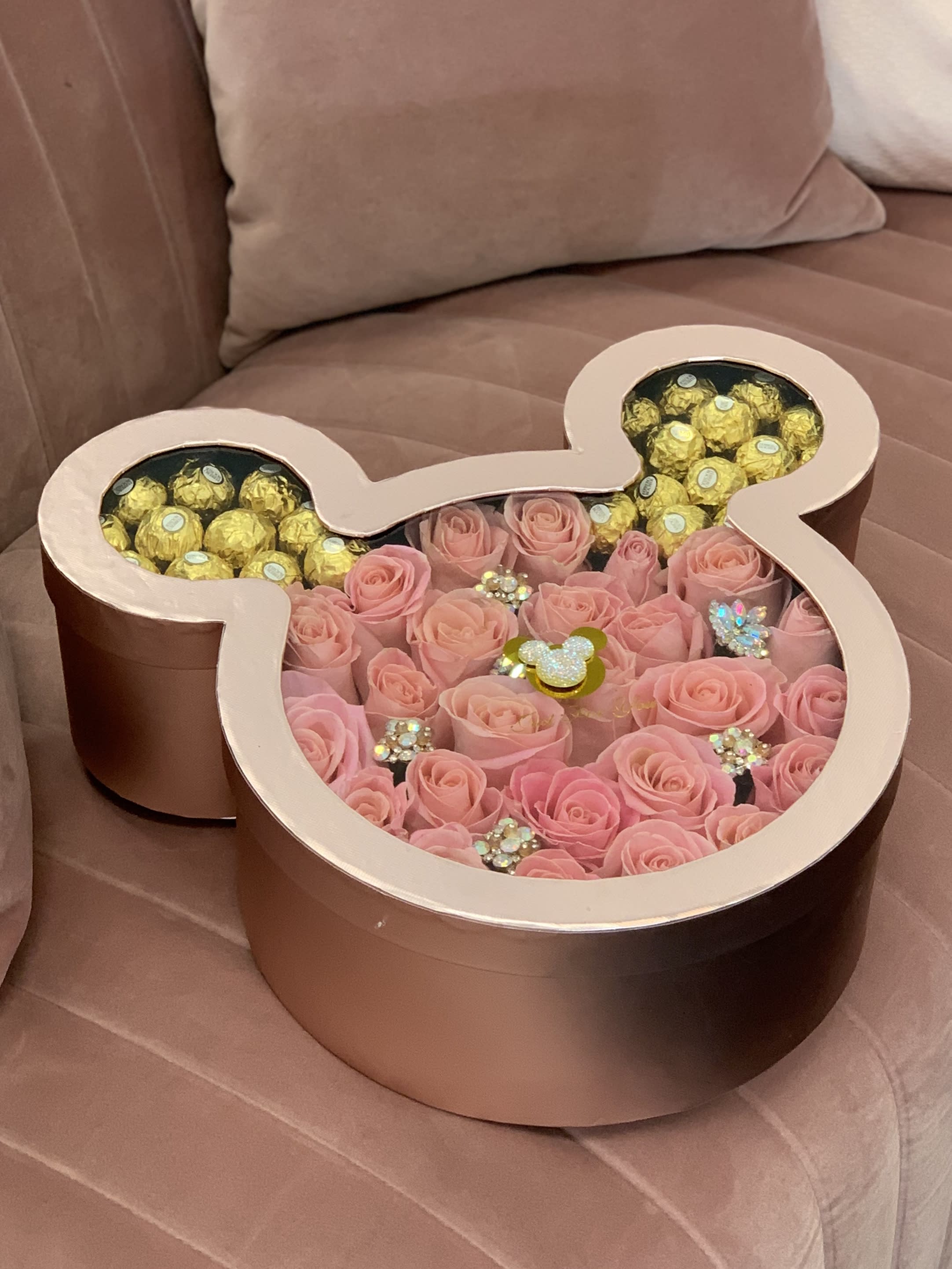 Micky's Magical Deluxe  - Micky Mouse-inspired face full of roses and ears filled with golden-wrapped Ferrero Chocolates enhanced with the bling-bling of Micky throughout