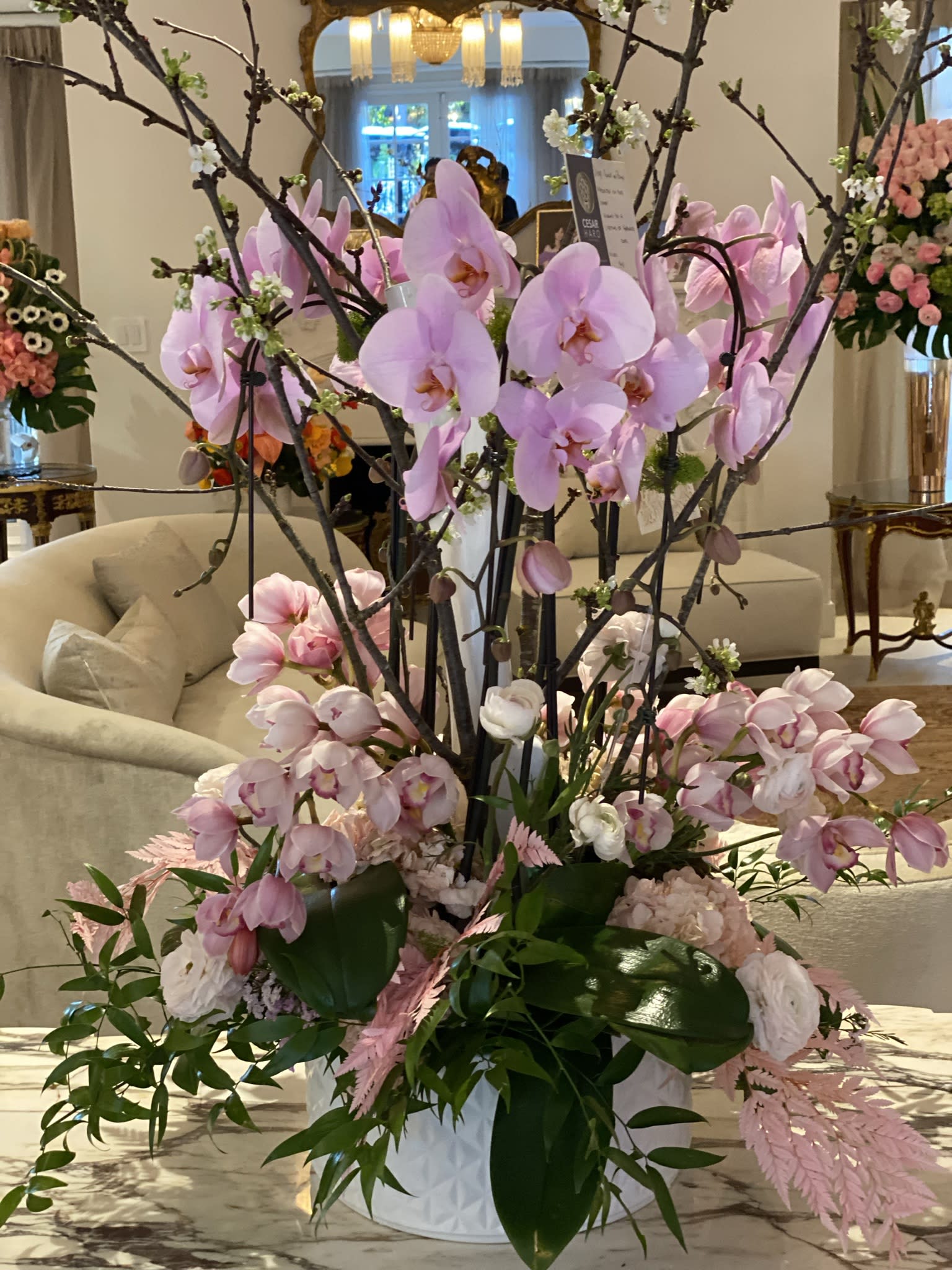 Beautiful In Pink - Unique ceramic white vase with orchids, fresh flowers and lots of charm to bring beauty to any room. 