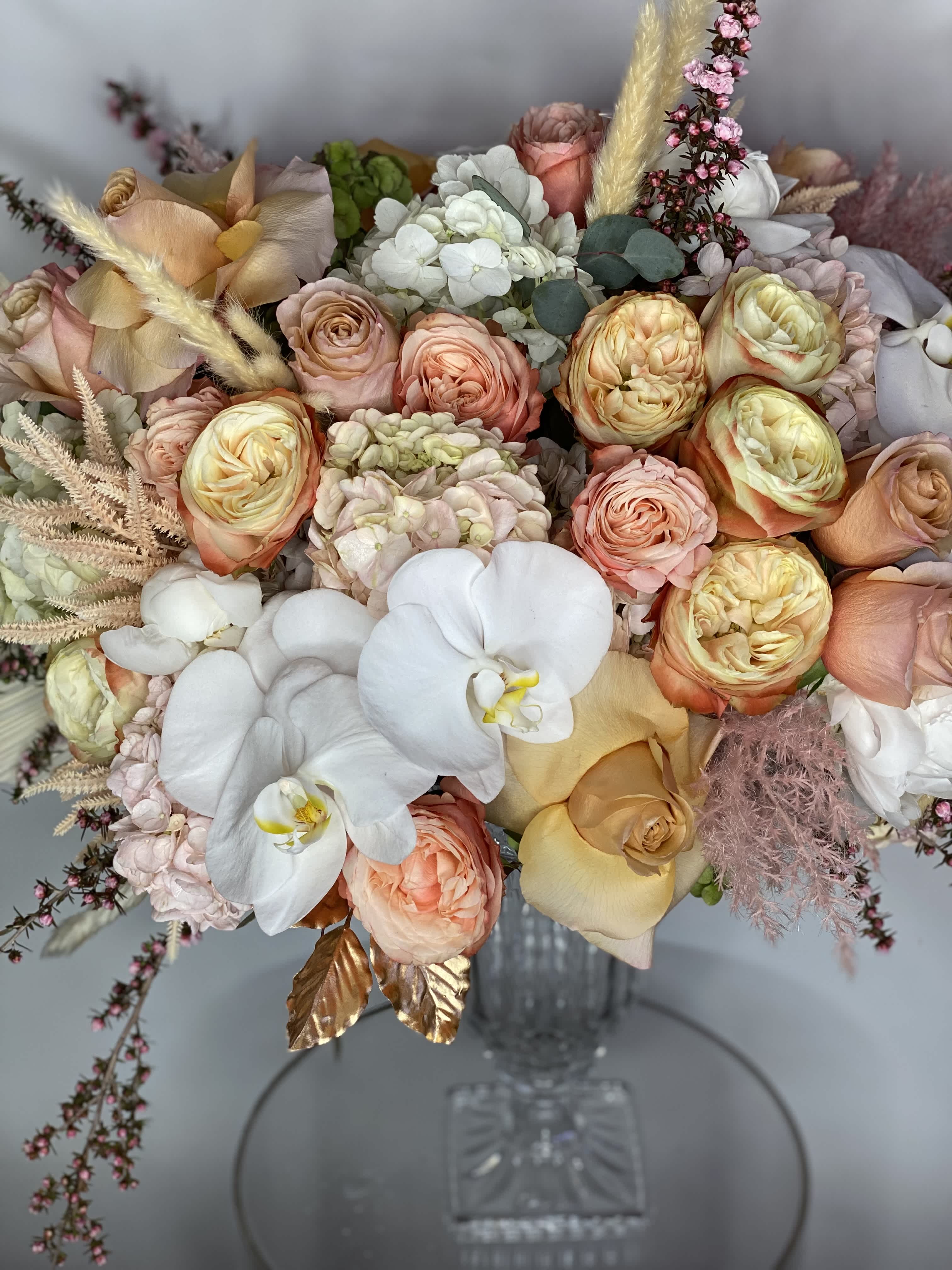 Neutral Statement  - Crystal vase, grounded neutrals, with a lot to say- a mother/grandmother favorite. 