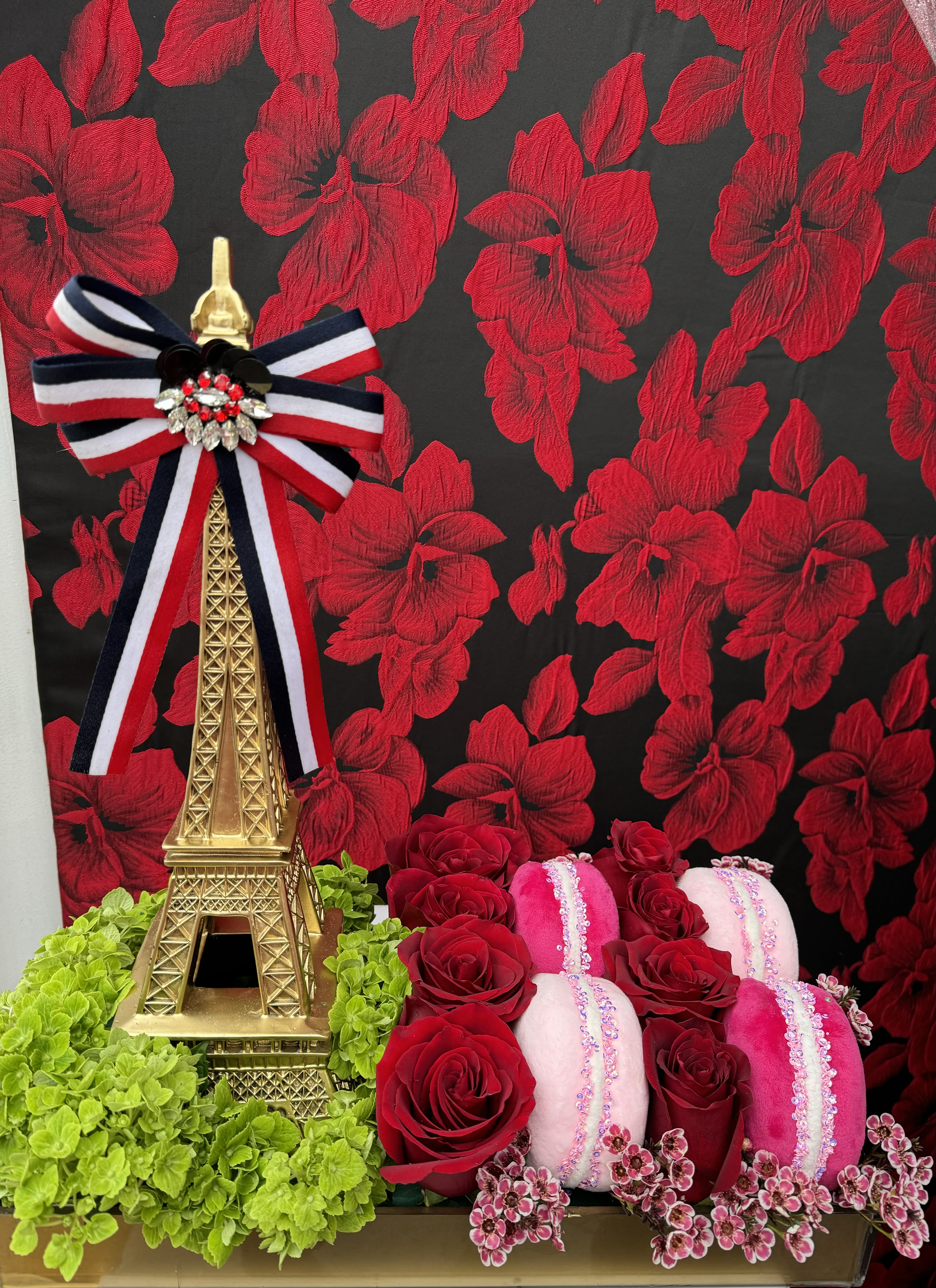 Parisian Romance  - Take a trip to Paris with this charming arrangement of red roses, hydrangeas, velvety macaroons and love, evoking the romantic spirit of the City of Light. The rich gold Tour Eiffel captures the essence of French elegance, transporting you to the enchanting streets of Paris with every glance. 