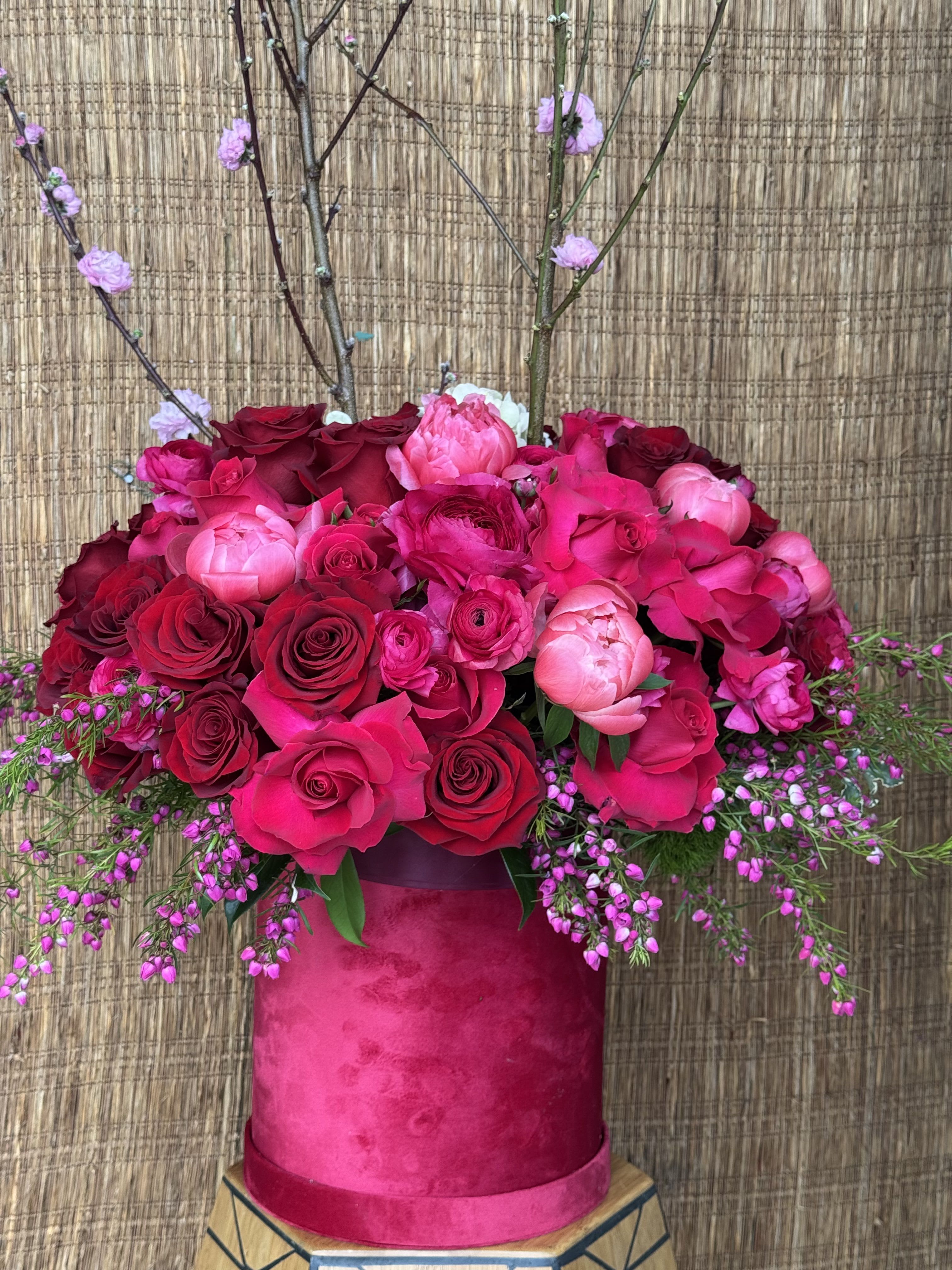 Pink Pony  - Deep colors Hot Pink, Red roses, Peonis Ranunculus