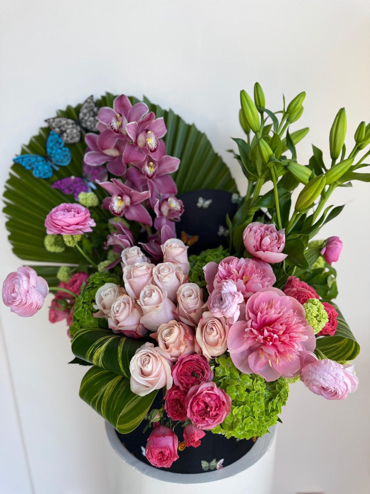 Spring Serenade  - A joyful symphony of seasonal blooms bursting with color and life, this arrangement captures the essence of a sunlit garden in full springtime bloom—fresh, vibrant, and full of heart.