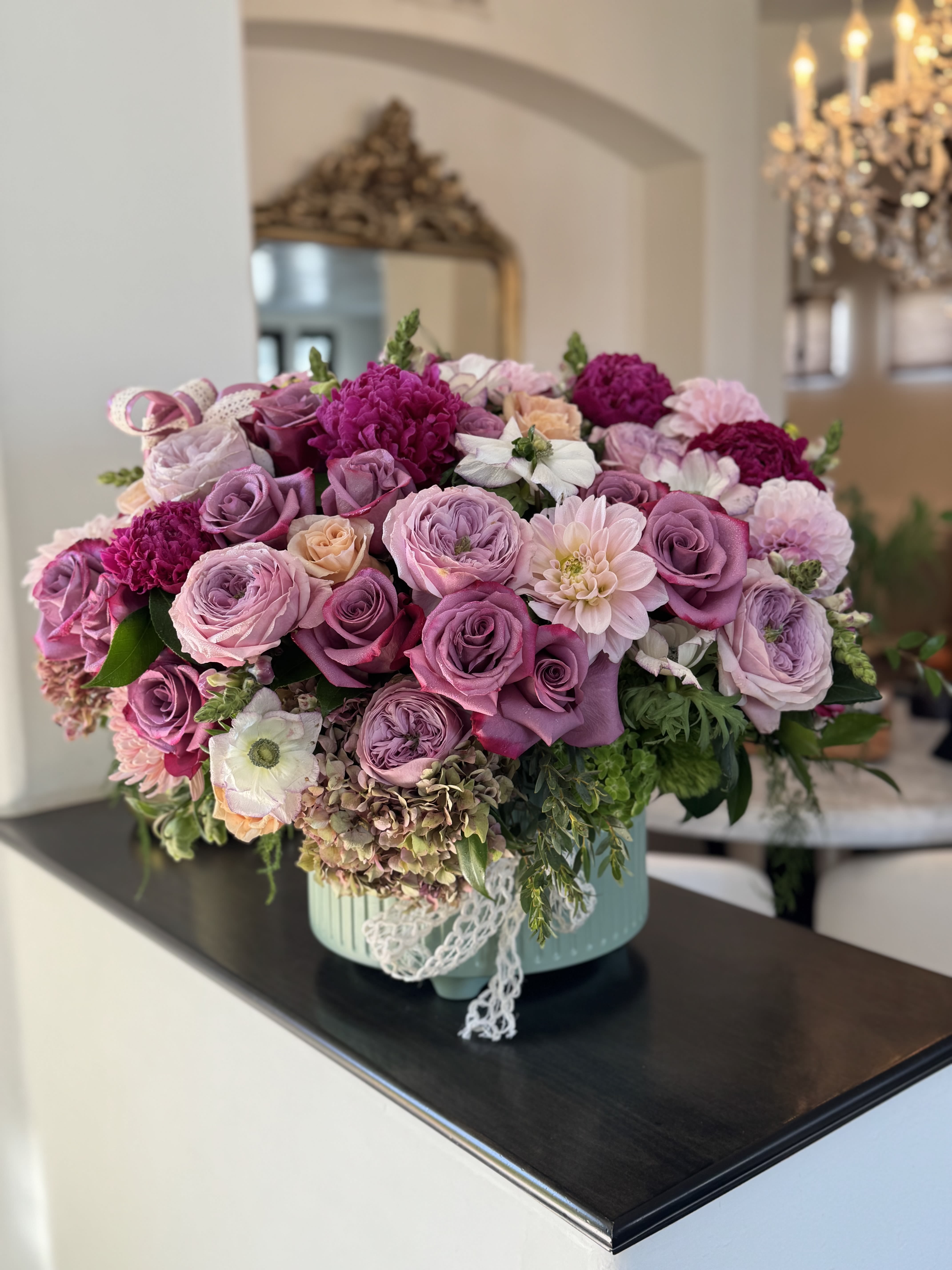 Enchanted By Beauty  - Gorgeous flowers beautifully designed in a nice round vase. 