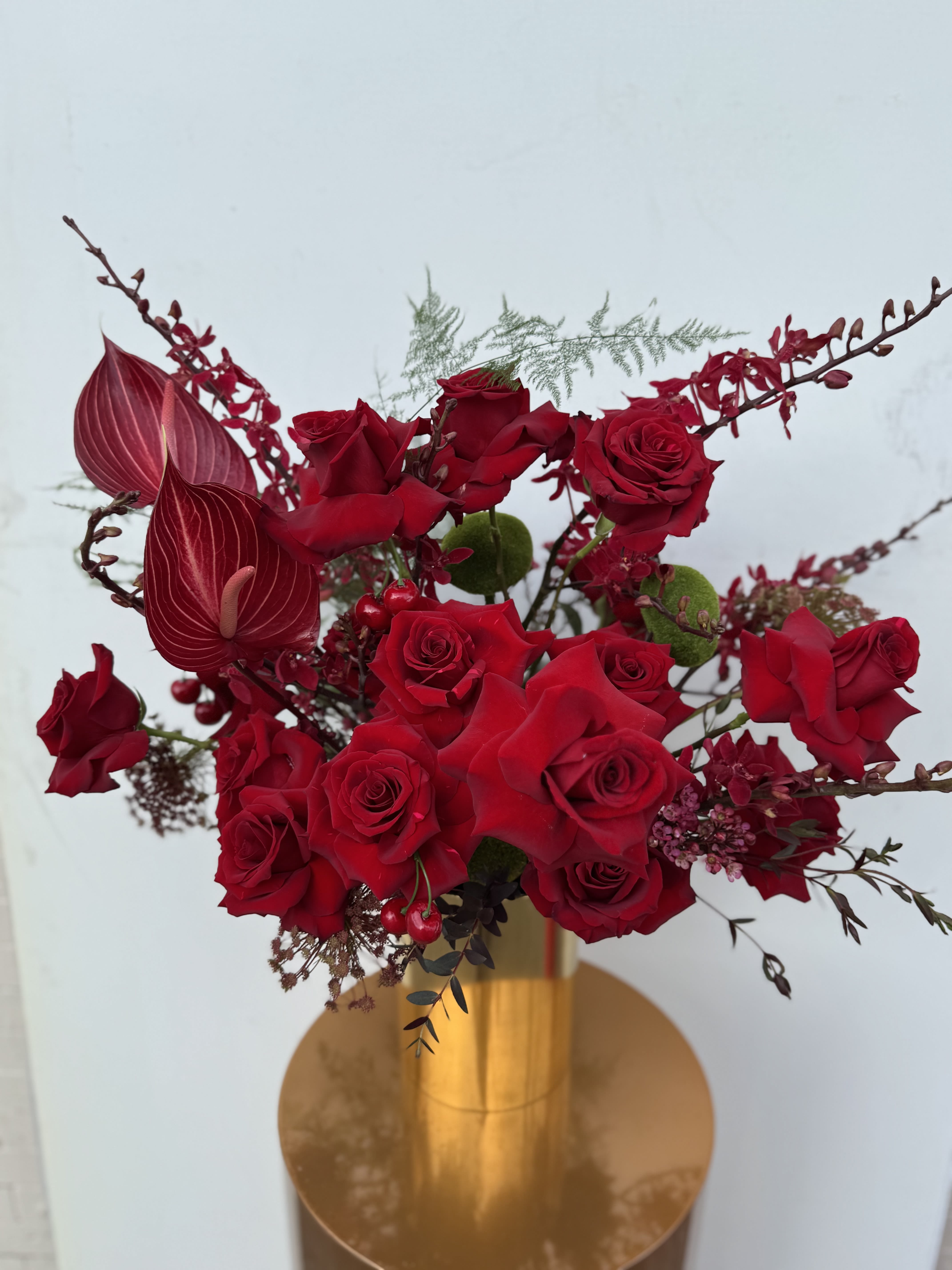 Wild Reds - Modern arrangement with wild reds untamed, sensual, with a new look to take your heart away.